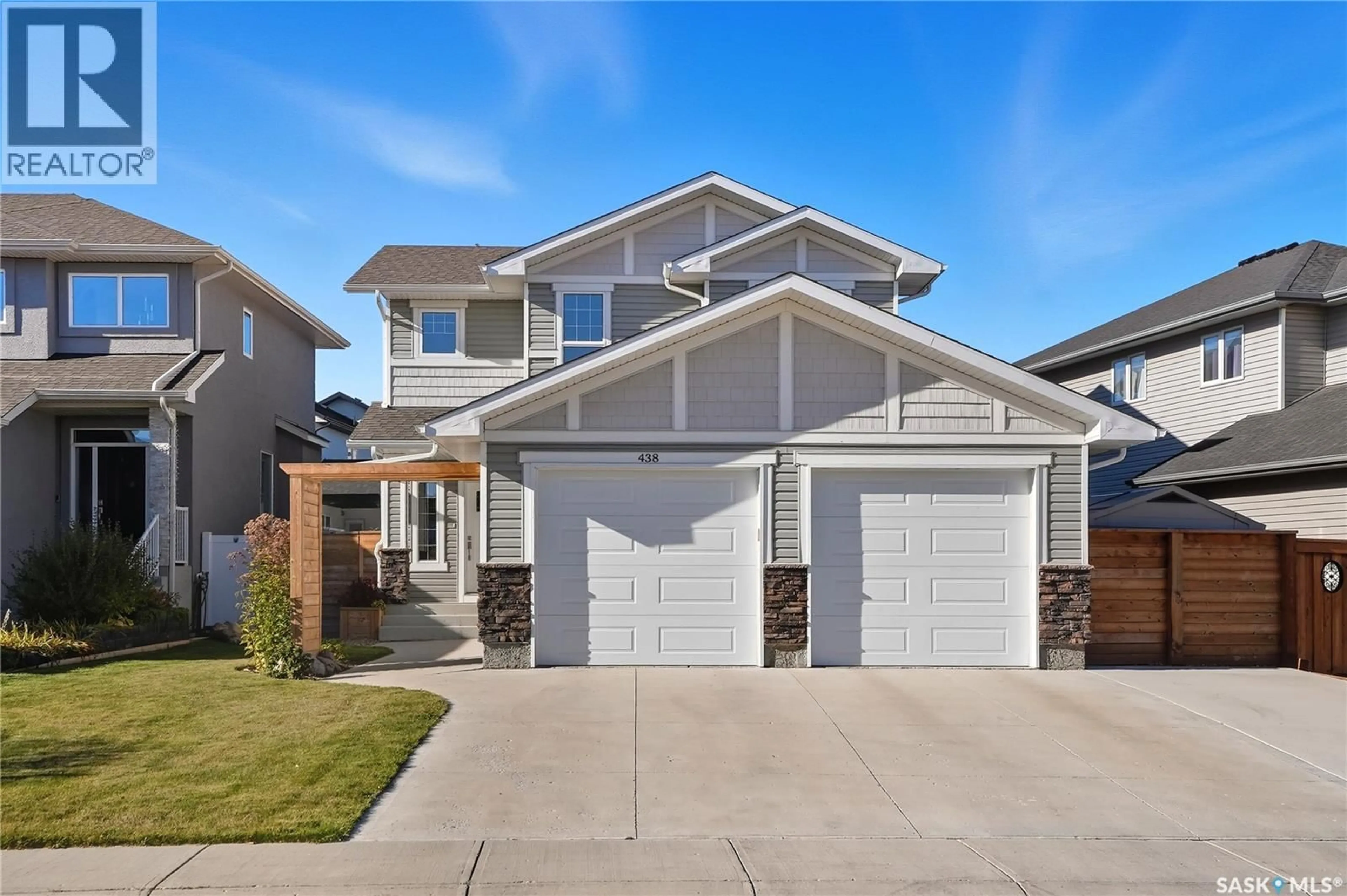 Home with vinyl exterior material, street for 438 FLYNN LANE, Saskatoon Saskatchewan S7V0A7