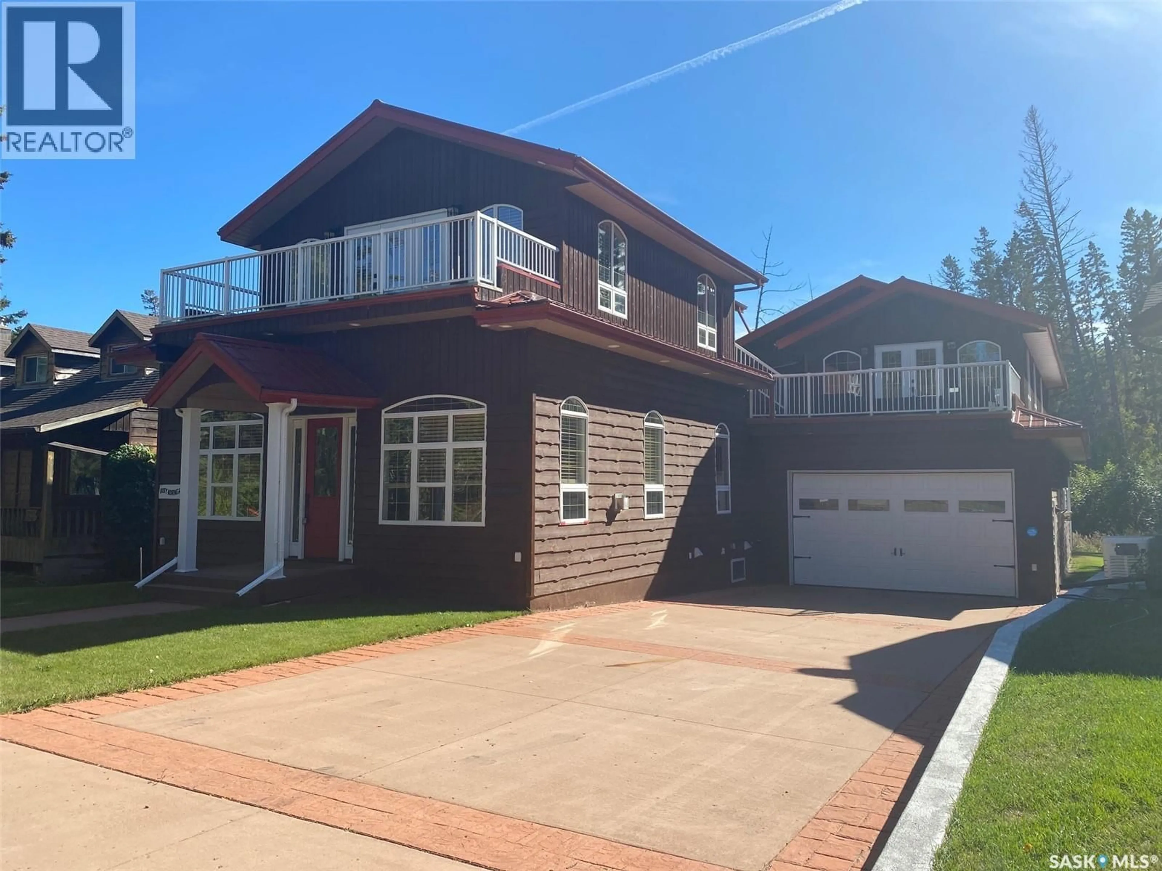 Home with brick exterior material, street for 1003 TOGO AVENUE, Kamsack Saskatchewan S0A1S0