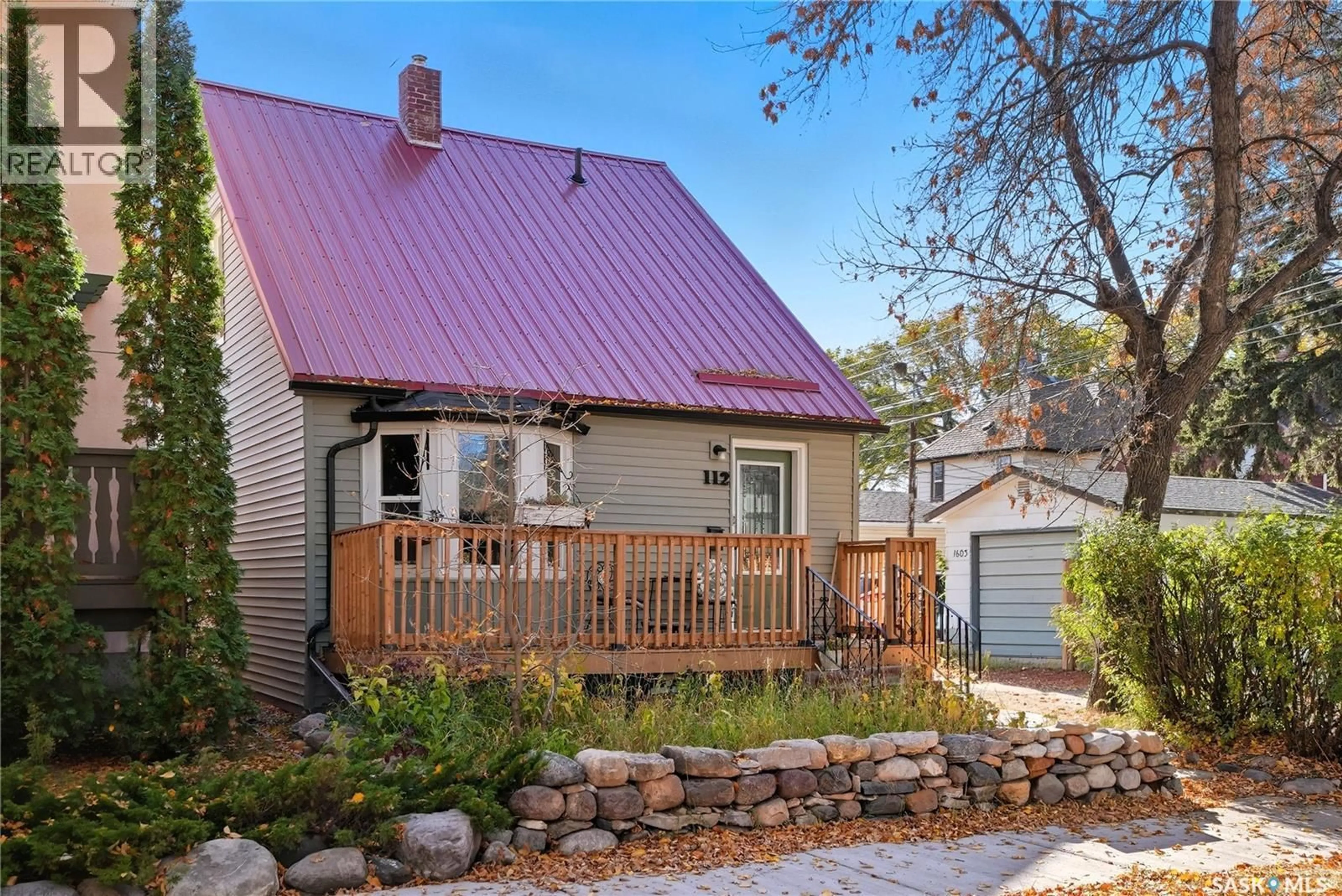Home with vinyl exterior material, street for 112 3RD STREET, Saskatoon Saskatchewan S7H1L1