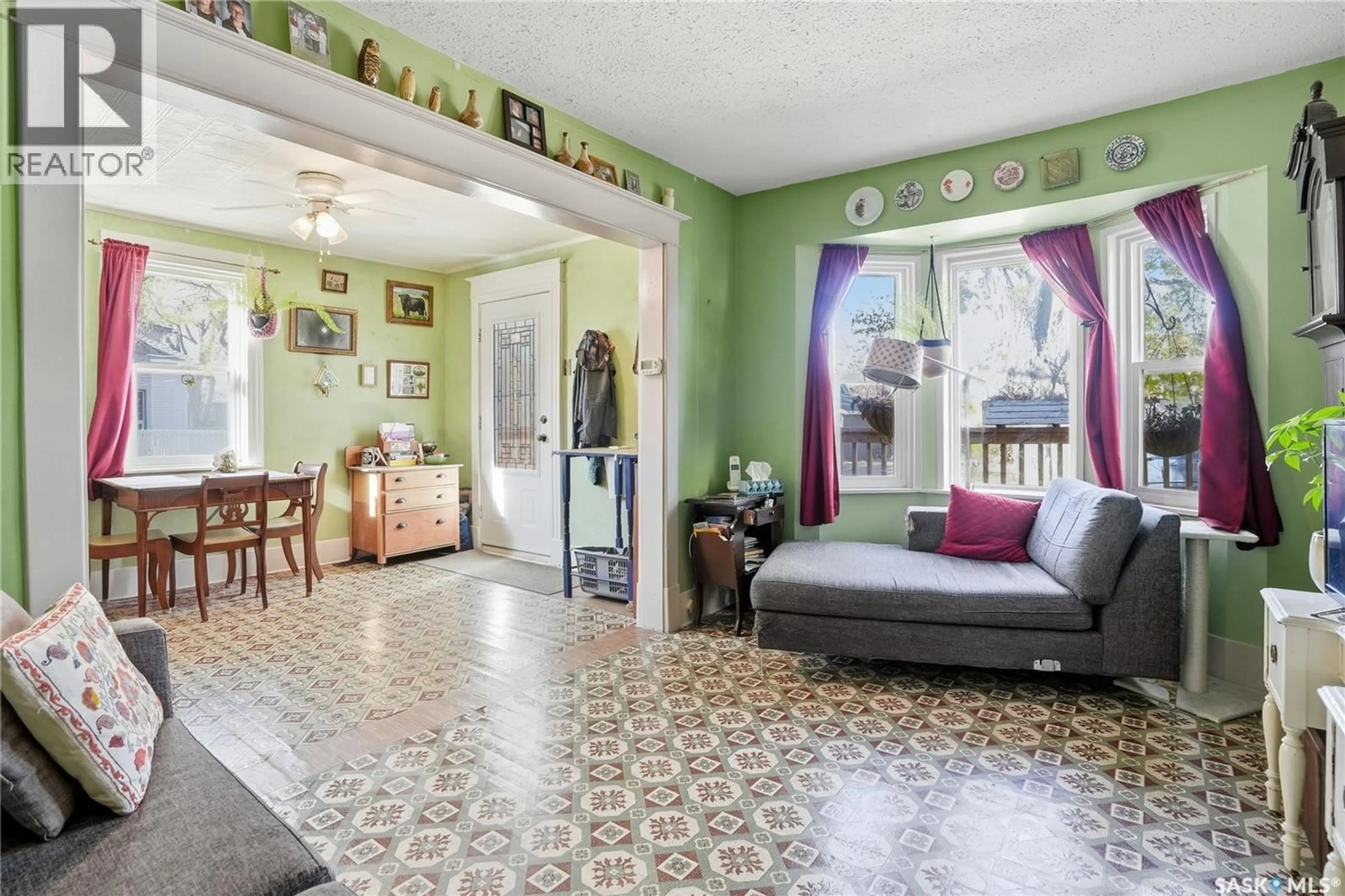 Living room with furniture, ceramic/tile floor for 112 3RD STREET, Saskatoon Saskatchewan S7H1L1