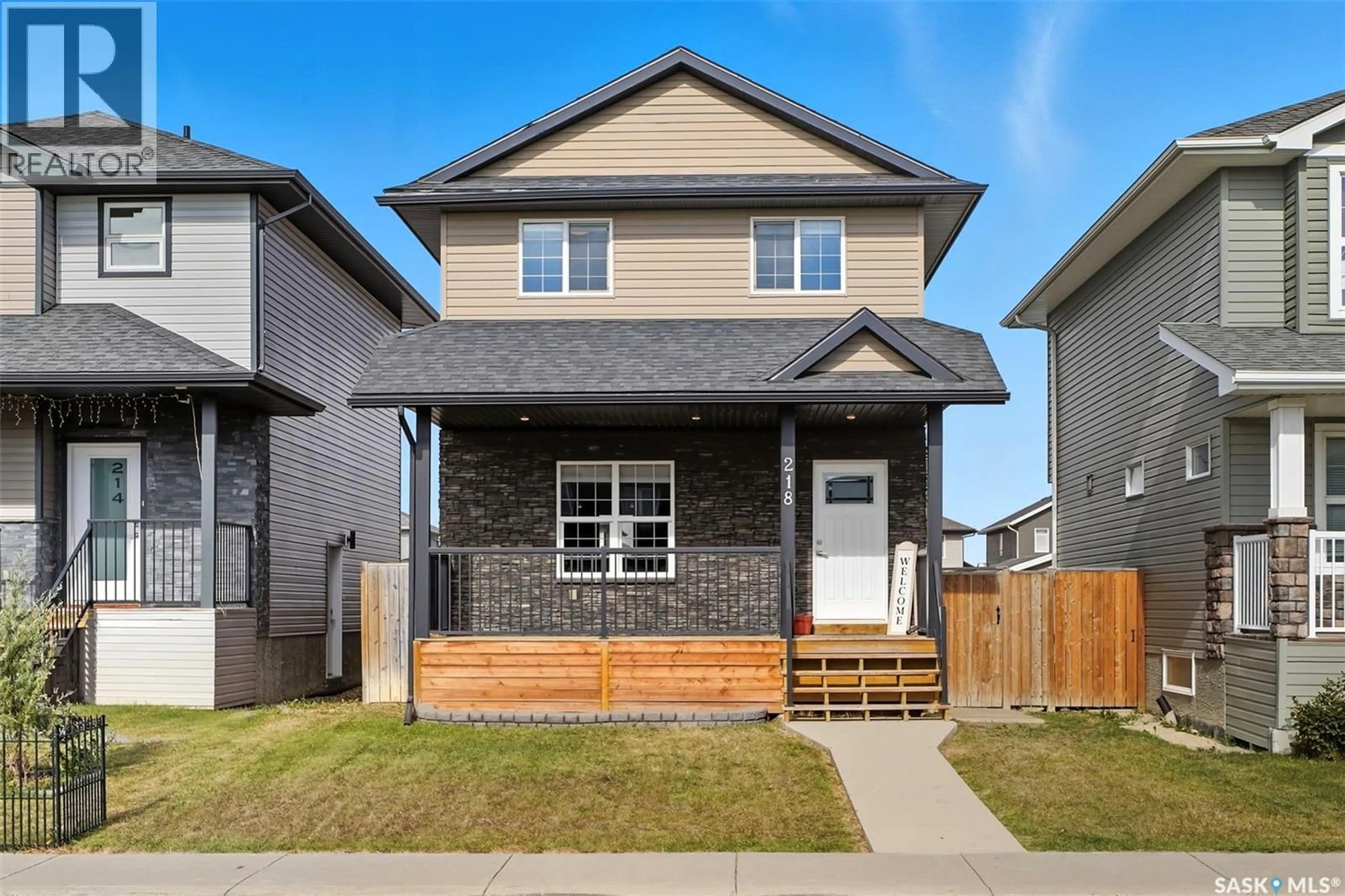 Home with vinyl exterior material, street for 218 KLOPPENBURG WAY, Saskatoon Saskatchewan S7W0N6