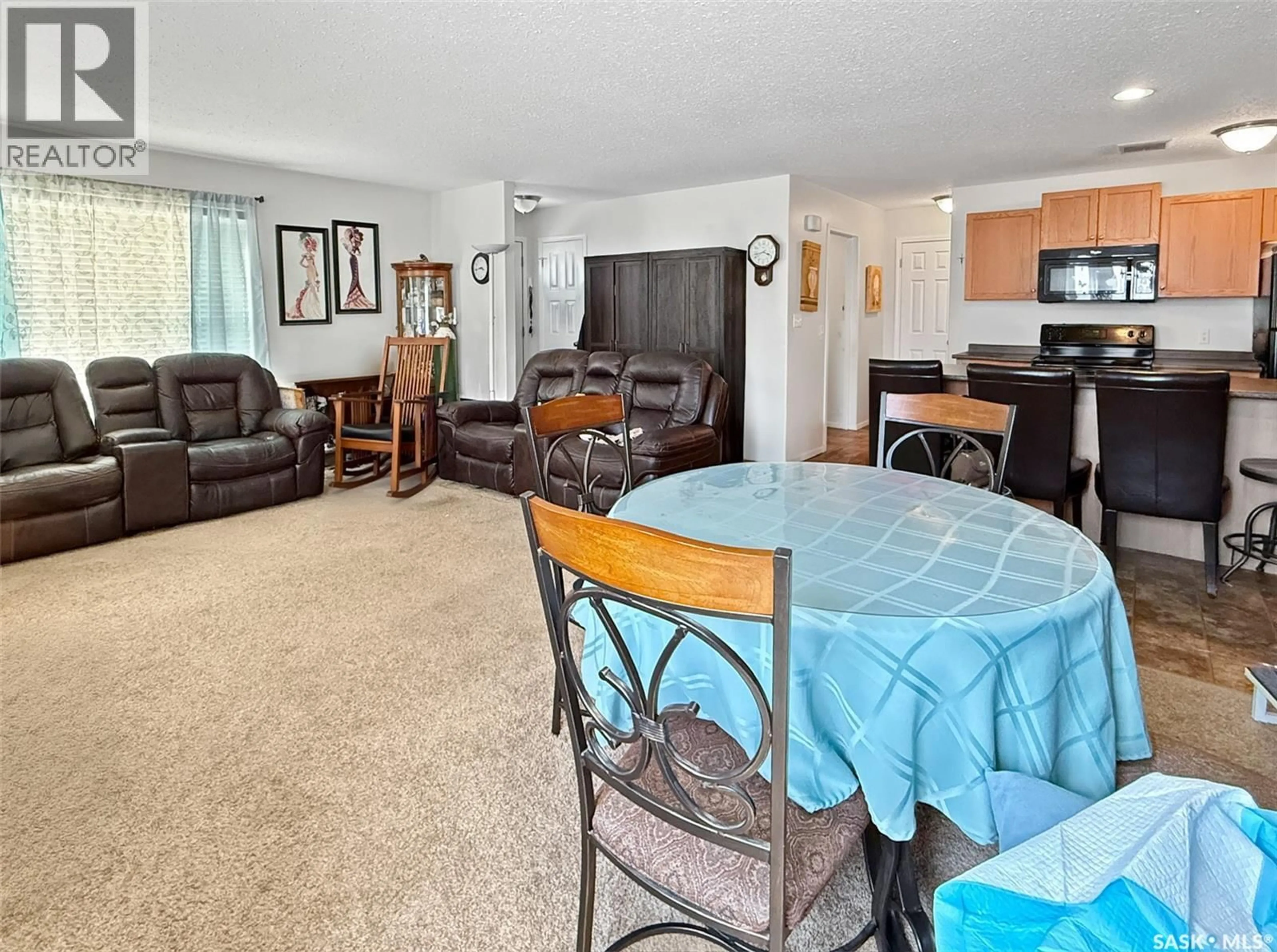 Living room with furniture, unknown for E - 15 1275 SOUTH RAILWAY STREET, Swift Current Saskatchewan S9H5P3