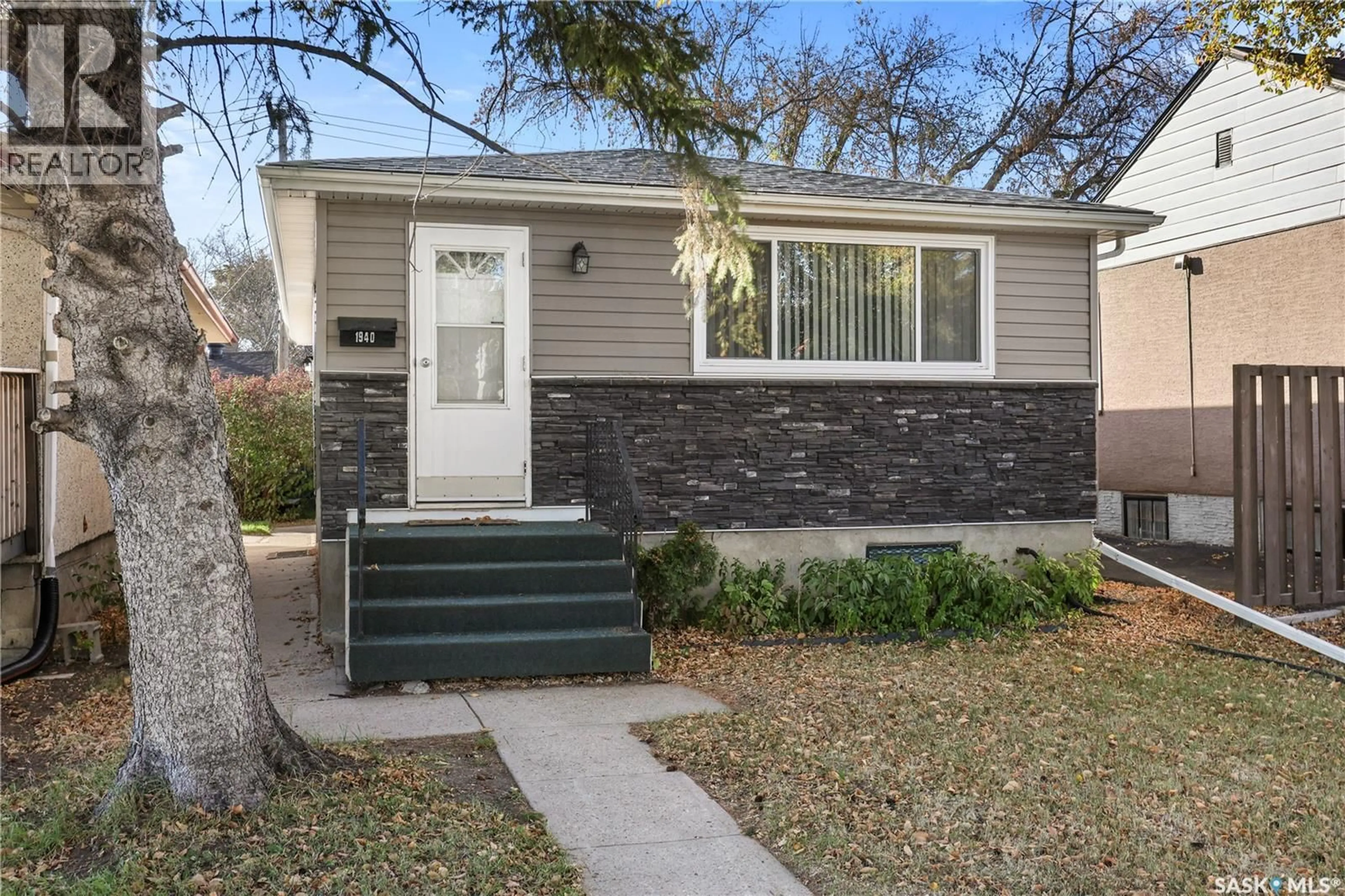 Home with vinyl exterior material, street for 1940 YORK STREET, Regina Saskatchewan S4T4R4