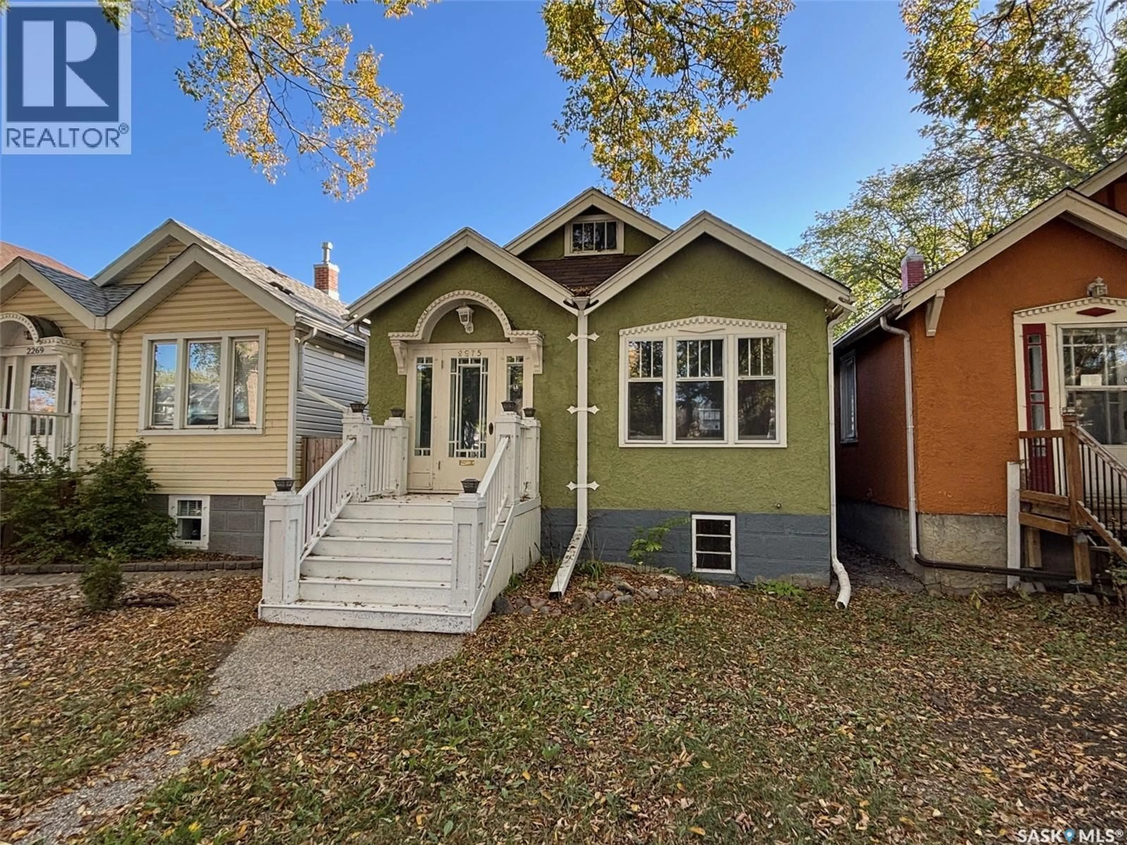 Home with vinyl exterior material, street for 2275 QUEBEC STREET, Regina Saskatchewan S4P1K3