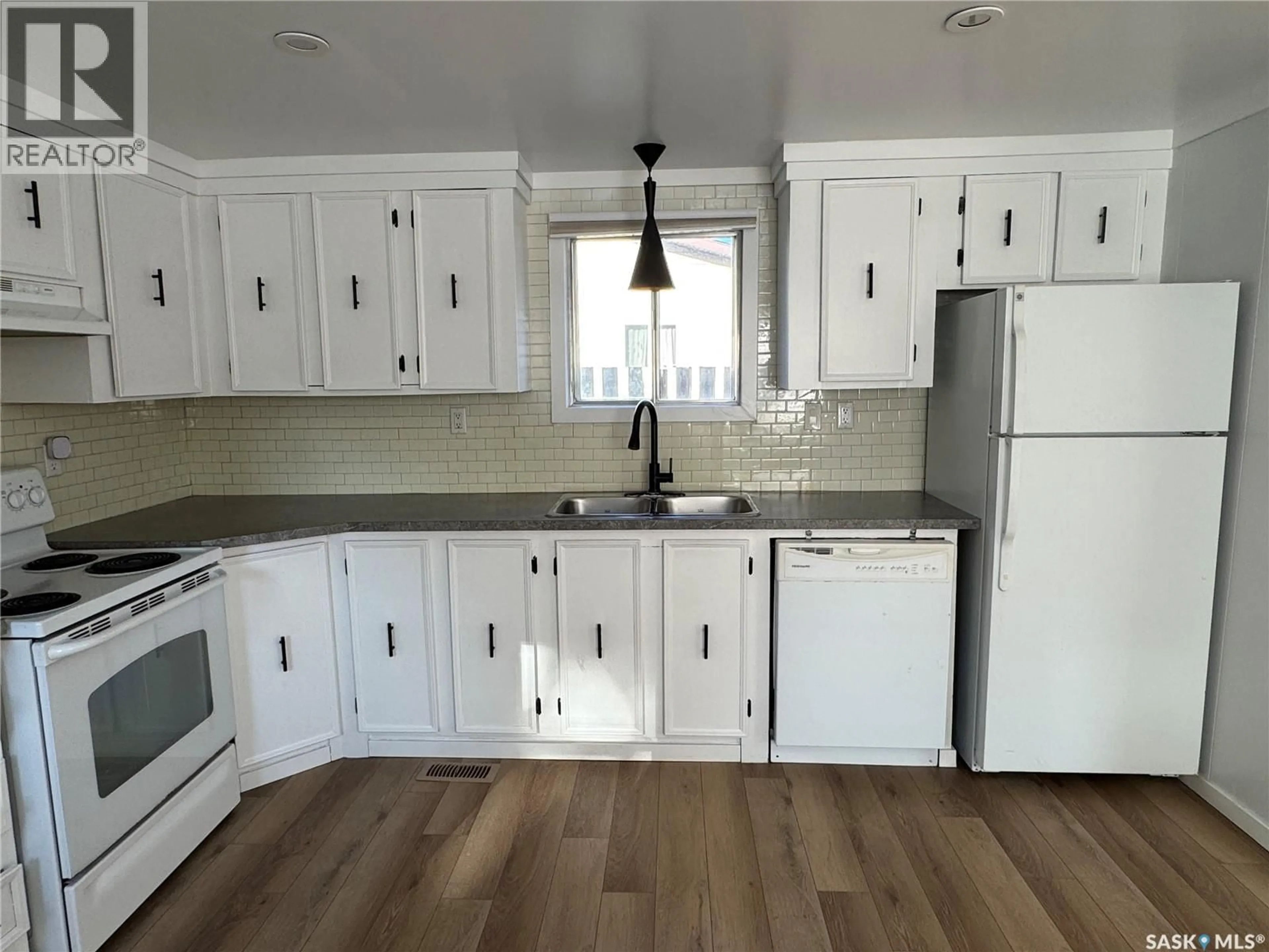 Standard kitchen, wood/laminate floor for 1119 DALBY CRESCENT, La Ronge Saskatchewan S0J1L0
