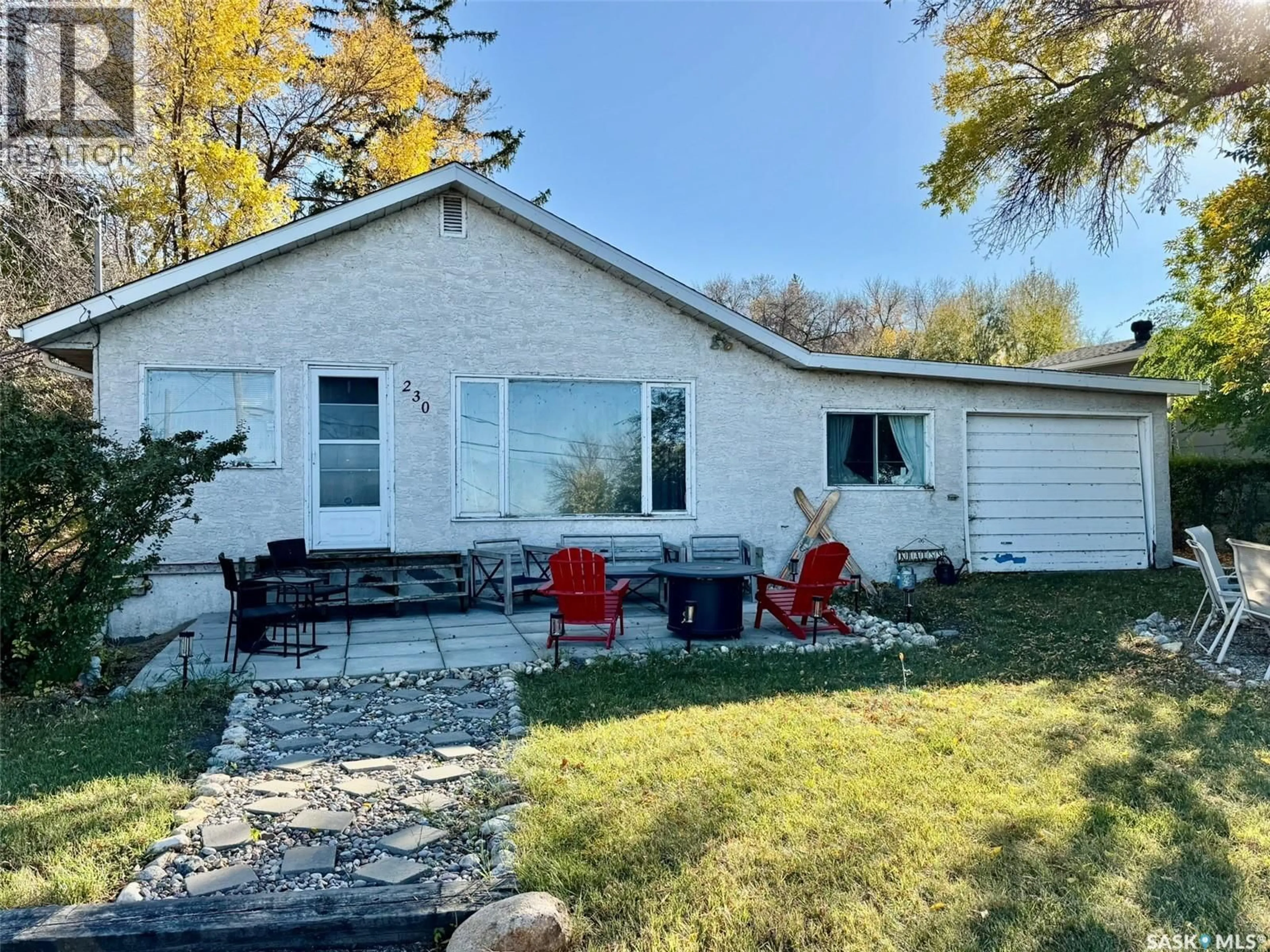 A pic from outside/outdoor area/front of a property/back of a property/a pic from drone, water/lake/river/ocean view for 230 DALY AVENUE, Regina Beach Saskatchewan S0G4C0