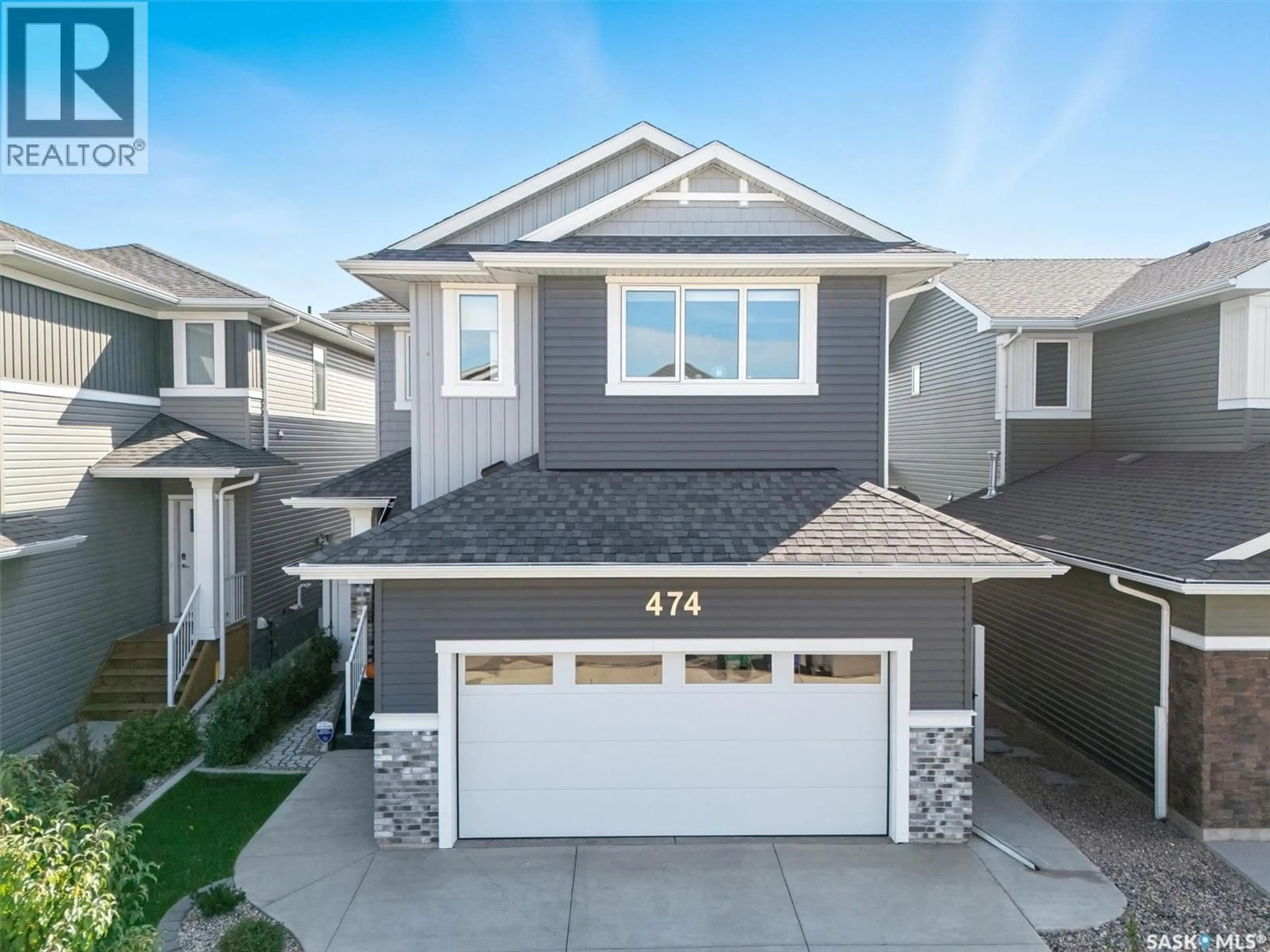 Home with vinyl exterior material, street for 474 MCFAULL CRESCENT, Saskatoon Saskatchewan S7V0T1