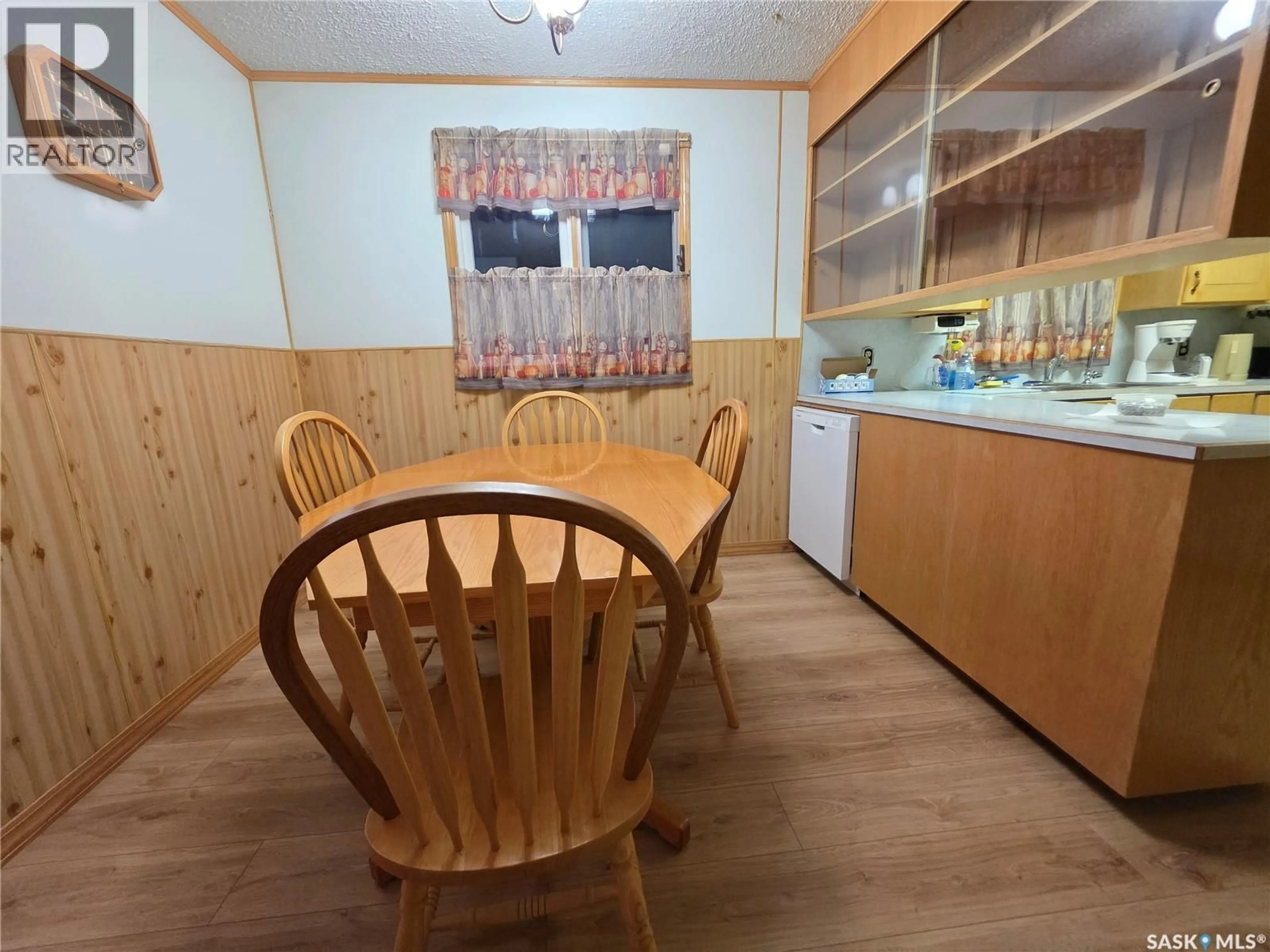 Dining room, wood/laminate floor for 304 3RD STREET, Cabri Saskatchewan S0N0J0