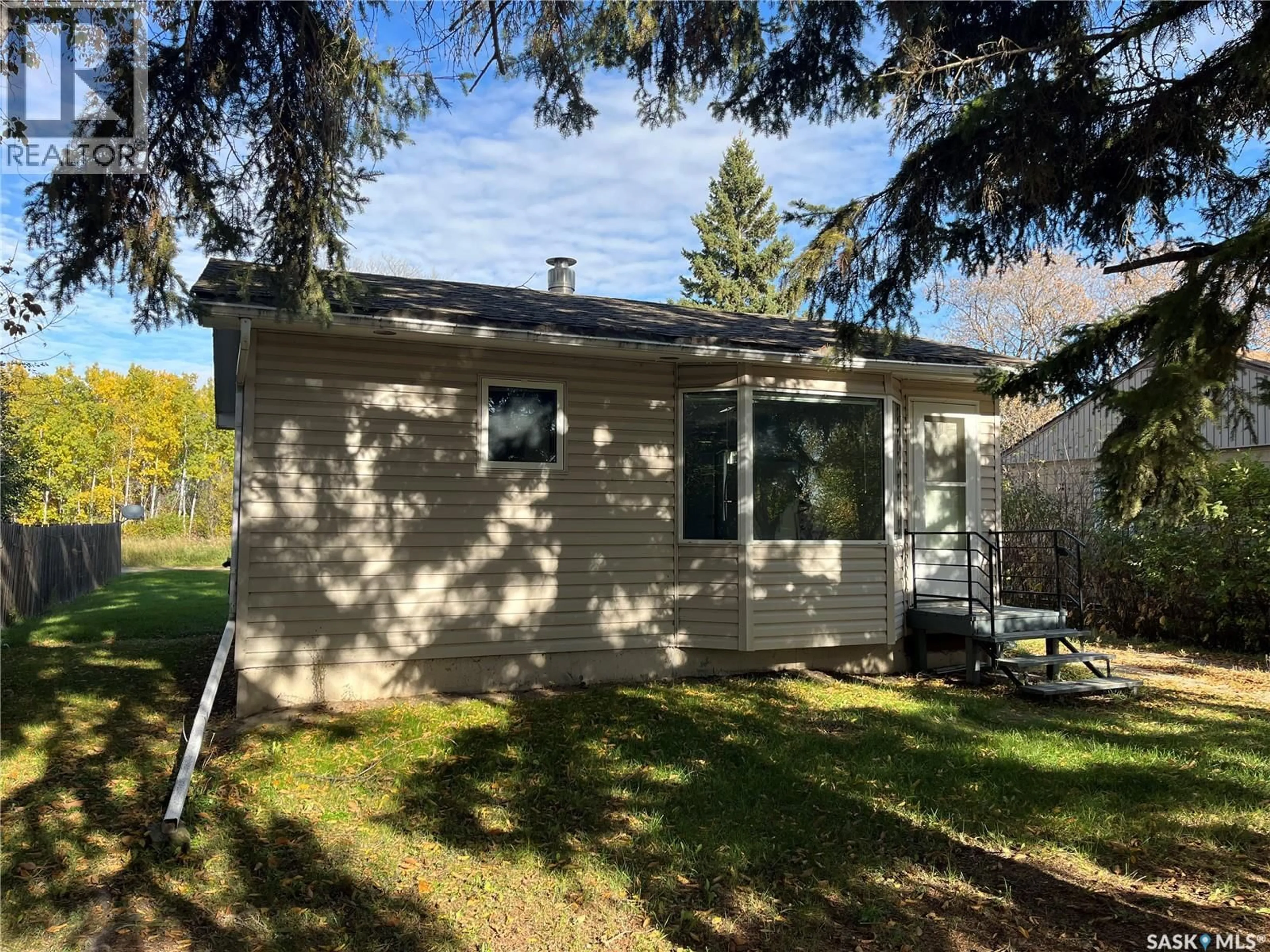 Home with vinyl exterior material, street for 58 HORKOFF AVENUE, Wadena Saskatchewan S0A4J0