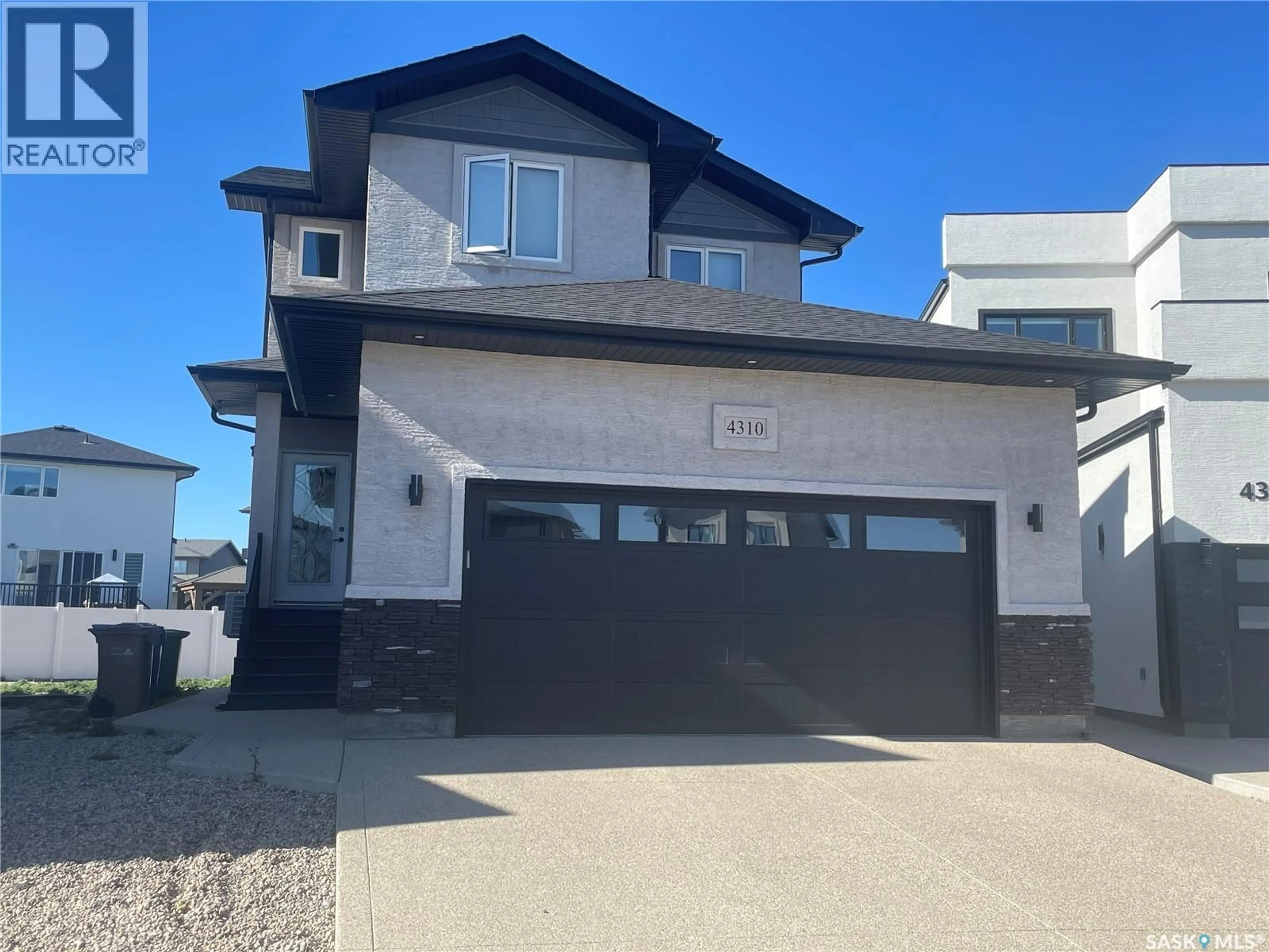 Home with vinyl exterior material, street for 4310 KINLOCH BAY, Regina Saskatchewan S4V3R7