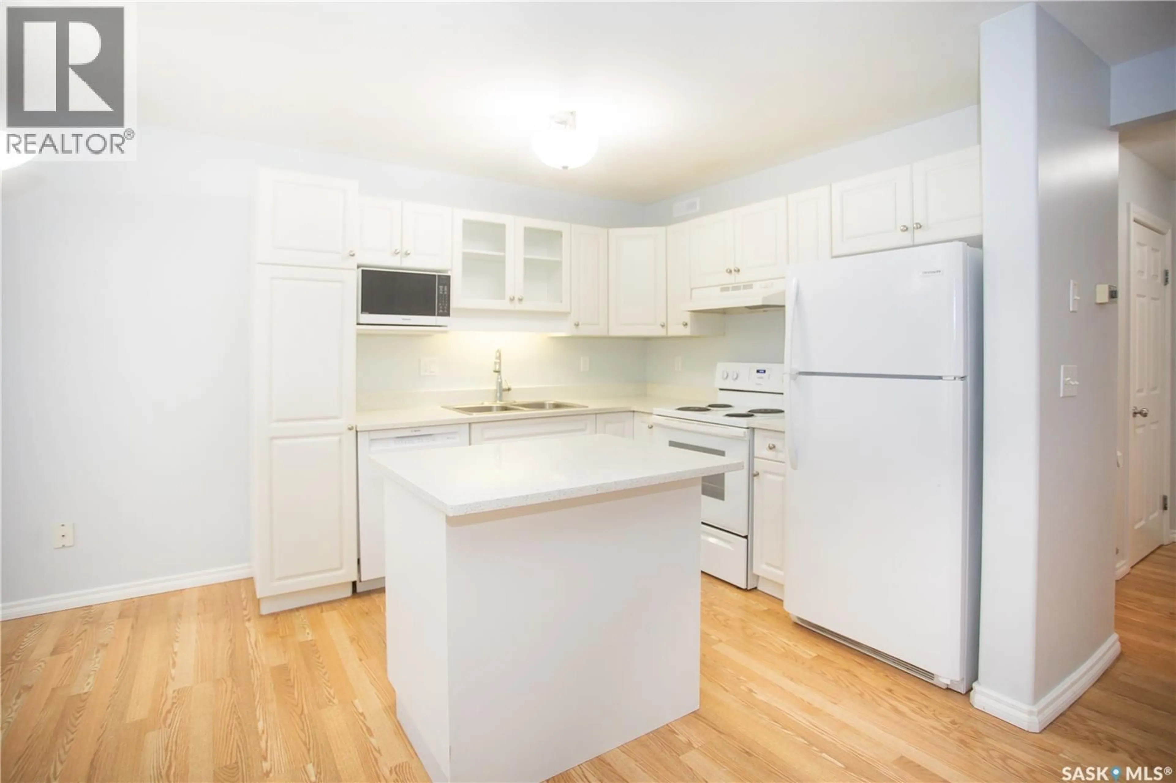 Standard kitchen, wood/laminate floor for 2 110 BANYAN CRESCENT, Saskatoon Saskatchewan S7V1G7