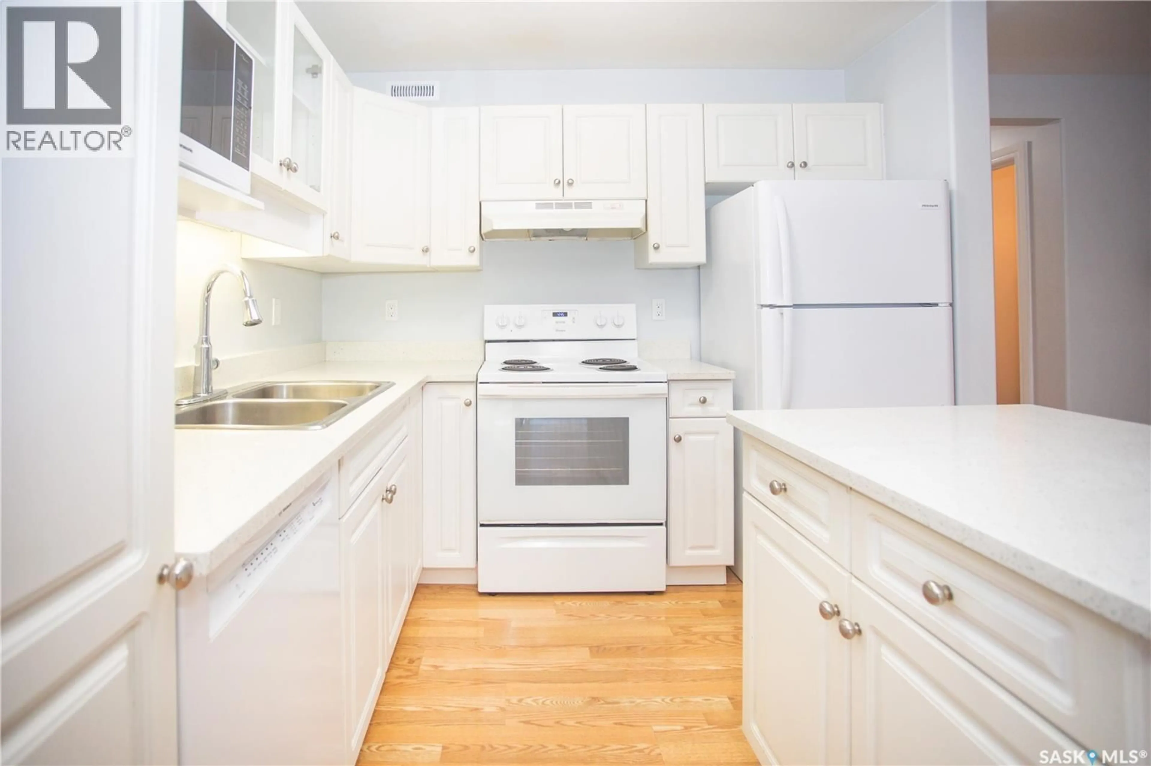Standard kitchen, wood/laminate floor for 2 110 BANYAN CRESCENT, Saskatoon Saskatchewan S7V1G7
