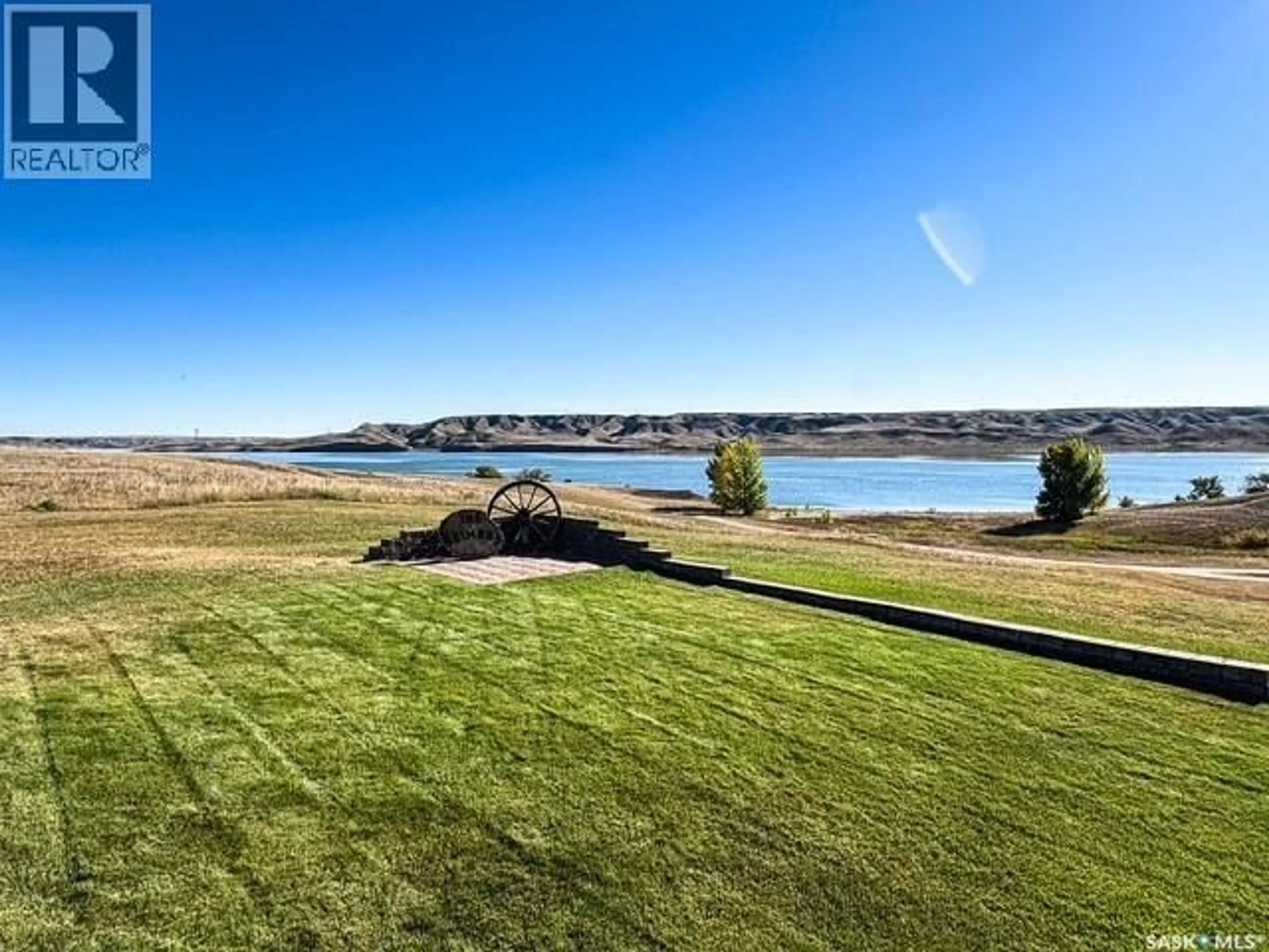 A pic from outside/outdoor area/front of a property/back of a property/a pic from drone, water/lake/river/ocean view for 70 CACTUS DRIVE, Saskatchewan Landing Prov Park Saskatchewan S9H3X5
