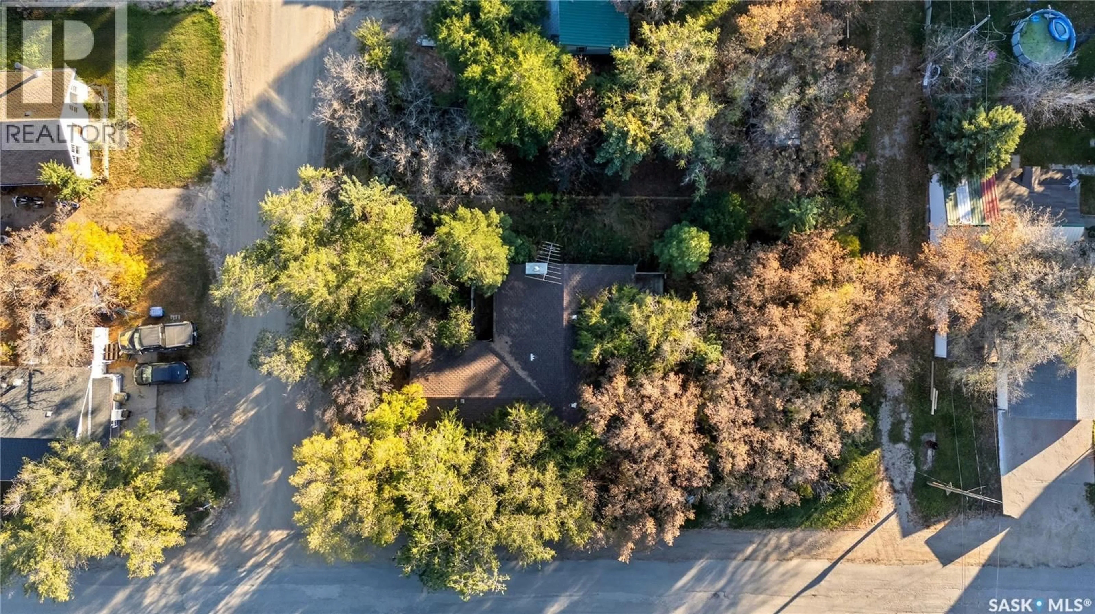 A pic from outside/outdoor area/front of a property/back of a property/a pic from drone, forest/trees view for 1 POPLAR AVENUE, Craven Saskatchewan S0G0W0