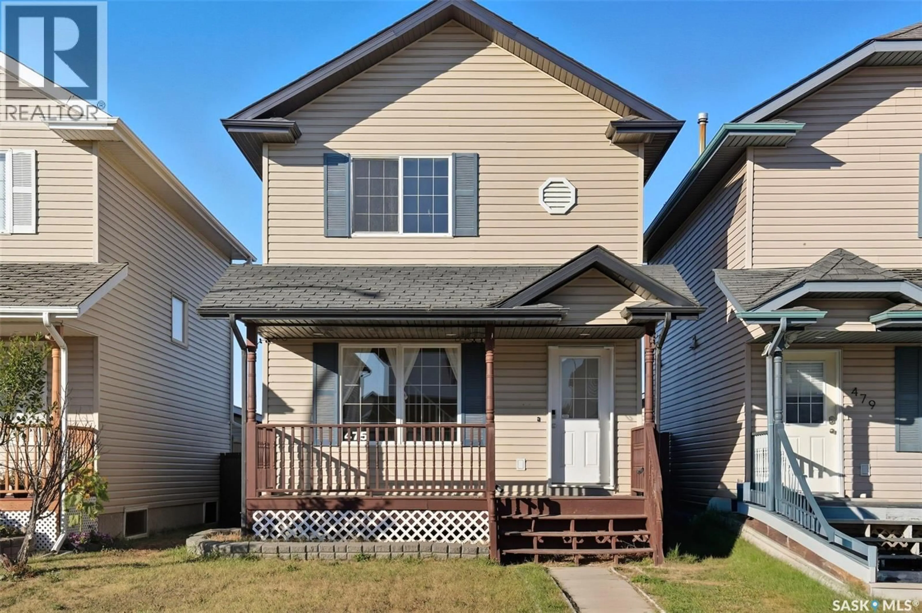 Home with vinyl exterior material, street for 475 BLAKENEY CRESCENT, Saskatoon Saskatchewan S7L7N3