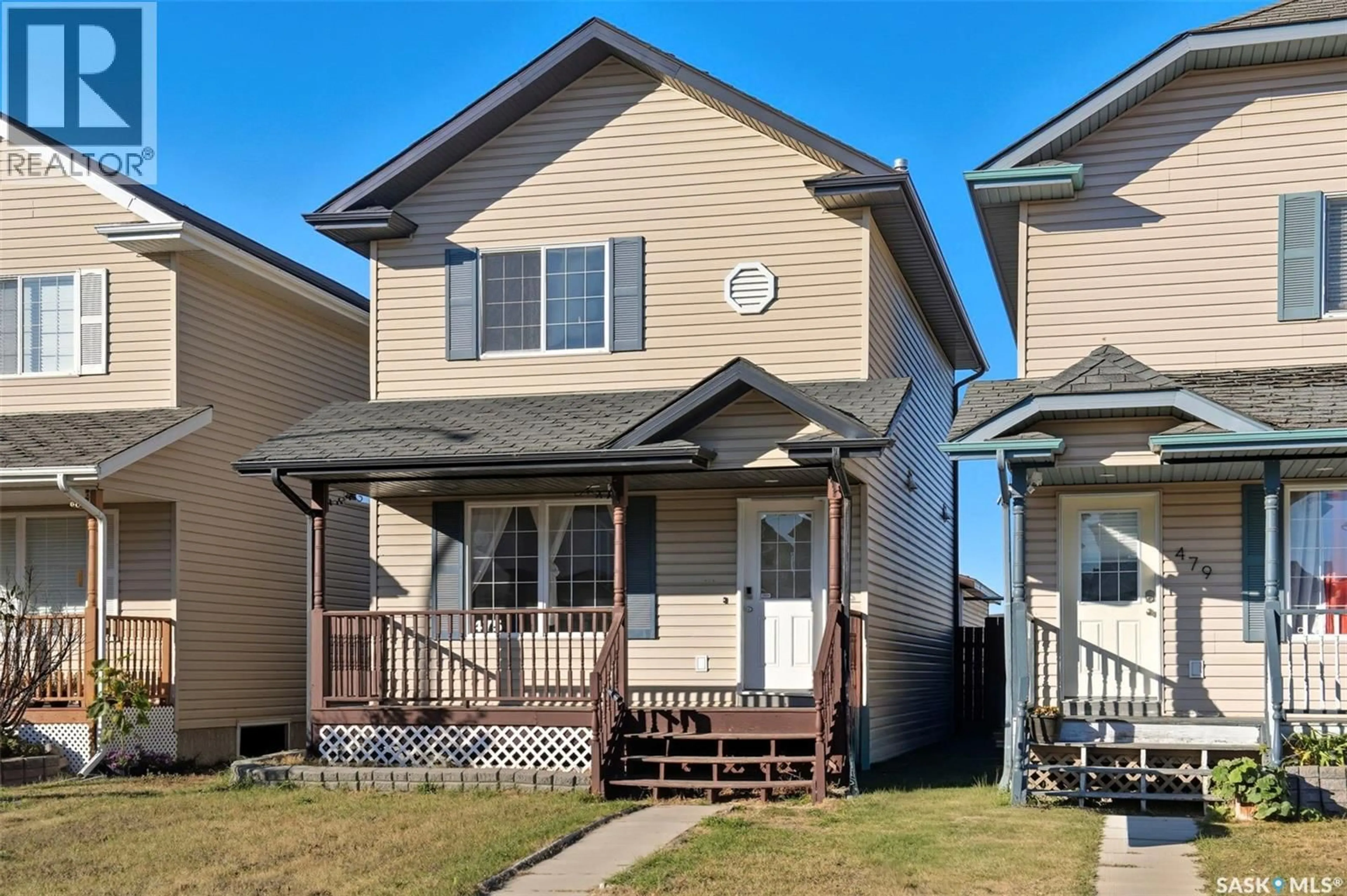 Home with vinyl exterior material, street for 475 BLAKENEY CRESCENT, Saskatoon Saskatchewan S7L7N3