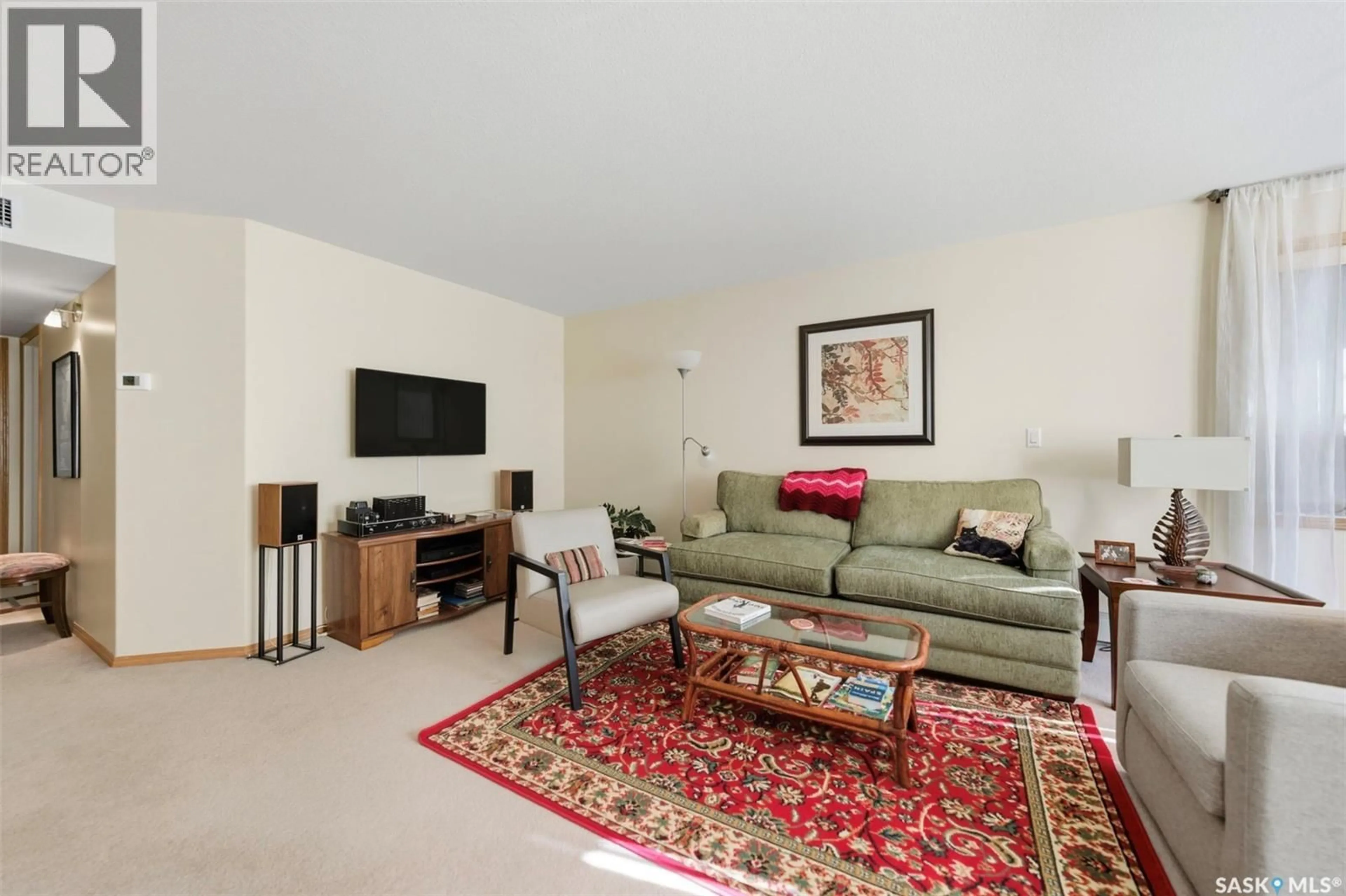 Living room with furniture, carpet floor for 505 - 104 MAIN STREET, Saskatoon Saskatchewan S7N0C2