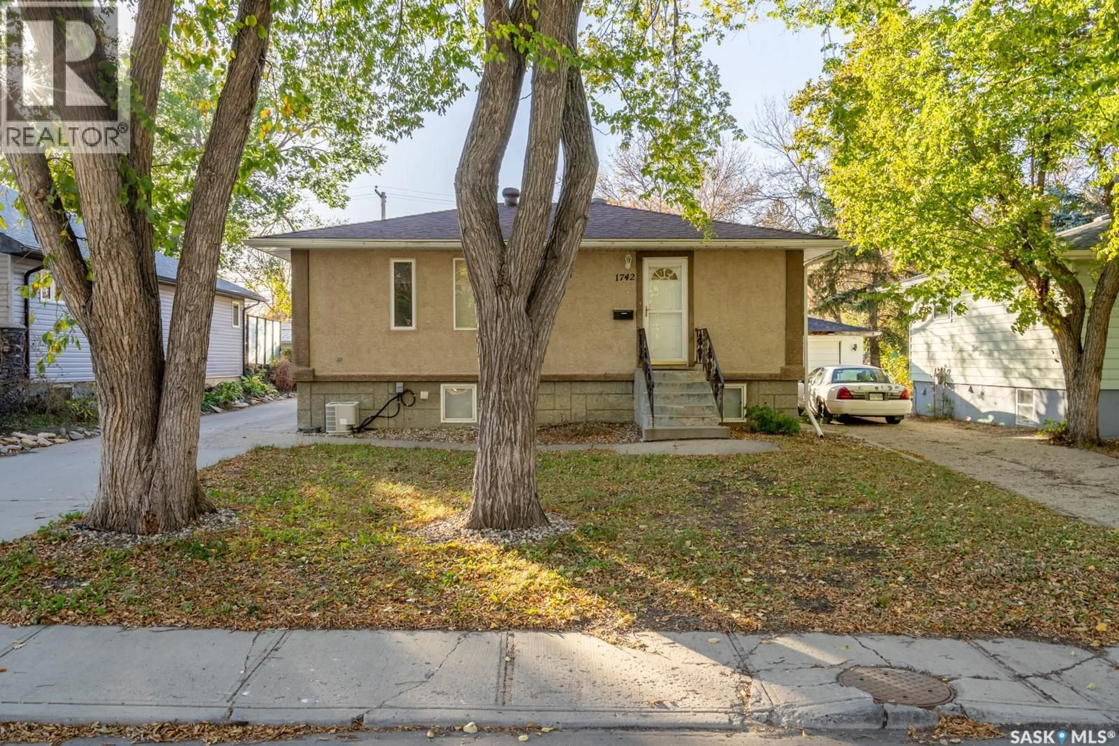 Home with vinyl exterior material, street for 1742 ARTHUR STREET, Regina Saskatchewan S4T4W3