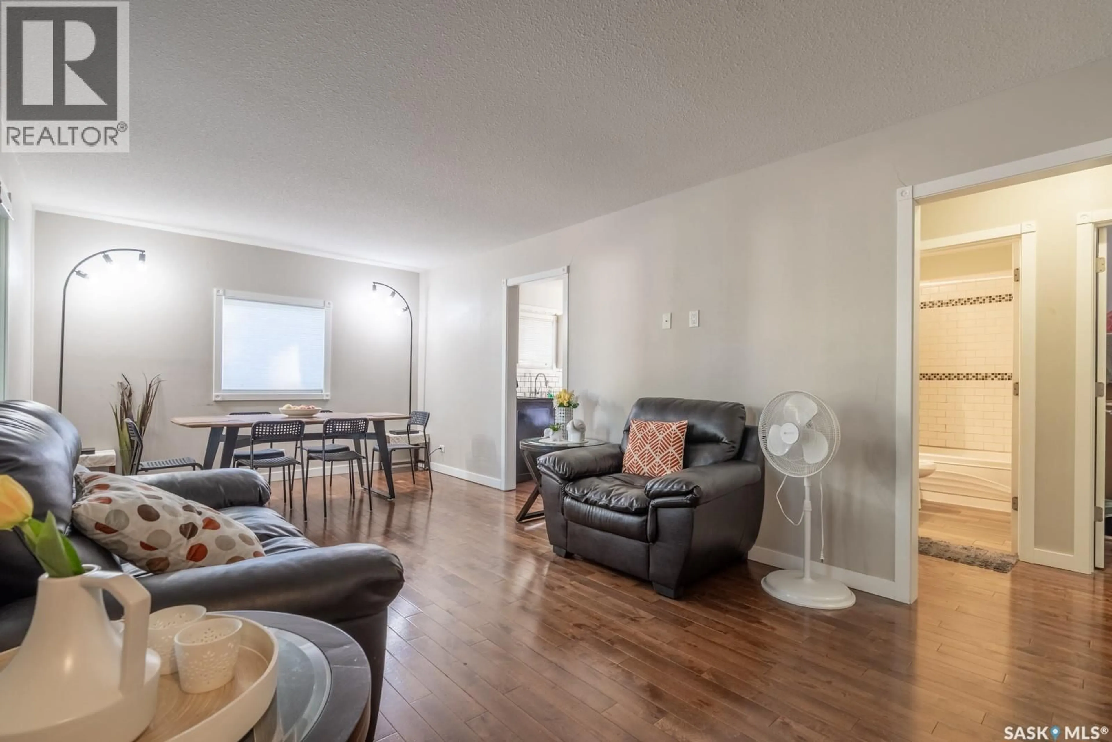 Living room with furniture, wood/laminate floor for 1742 ARTHUR STREET, Regina Saskatchewan S4T4W3