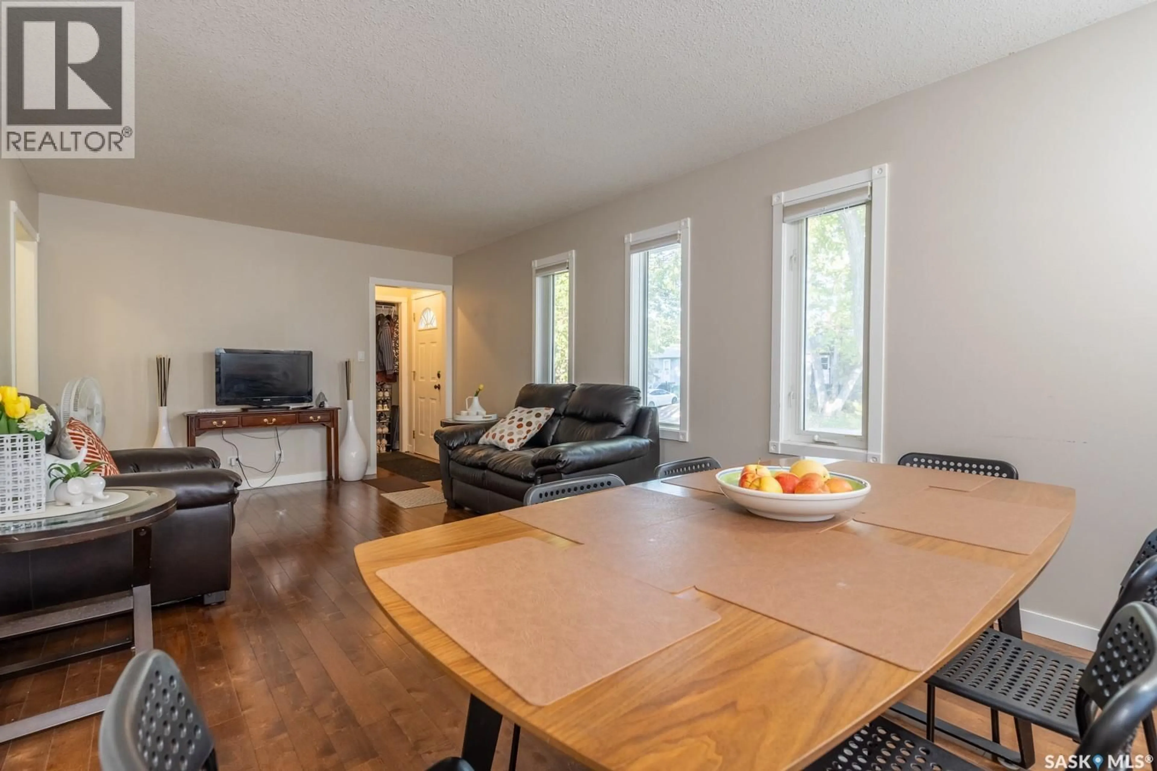 Living room with furniture, wood/laminate floor for 1742 ARTHUR STREET, Regina Saskatchewan S4T4W3