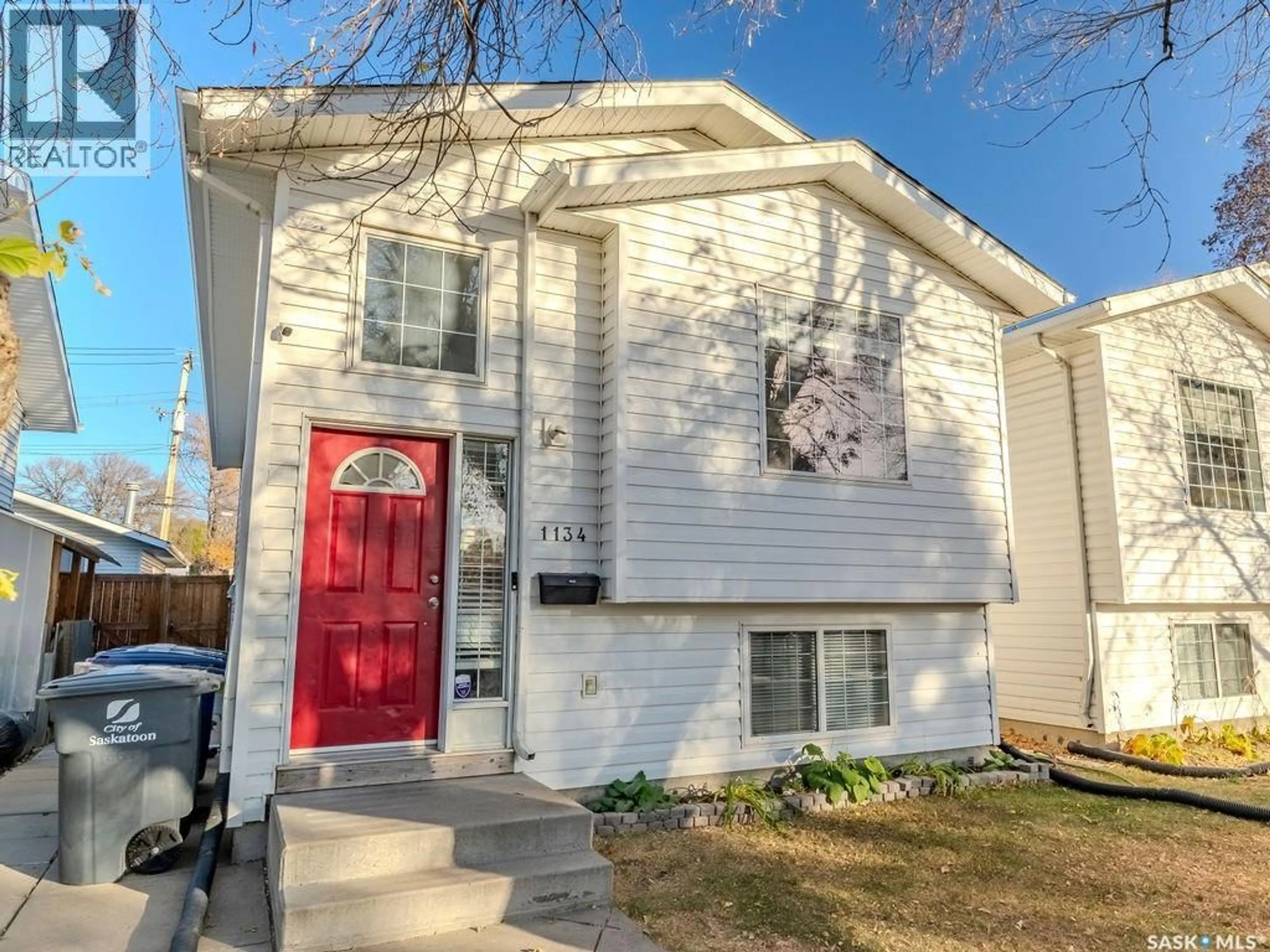 Home with vinyl exterior material, street for 1134 J AVENUE, Saskatoon Saskatchewan S7L2L6