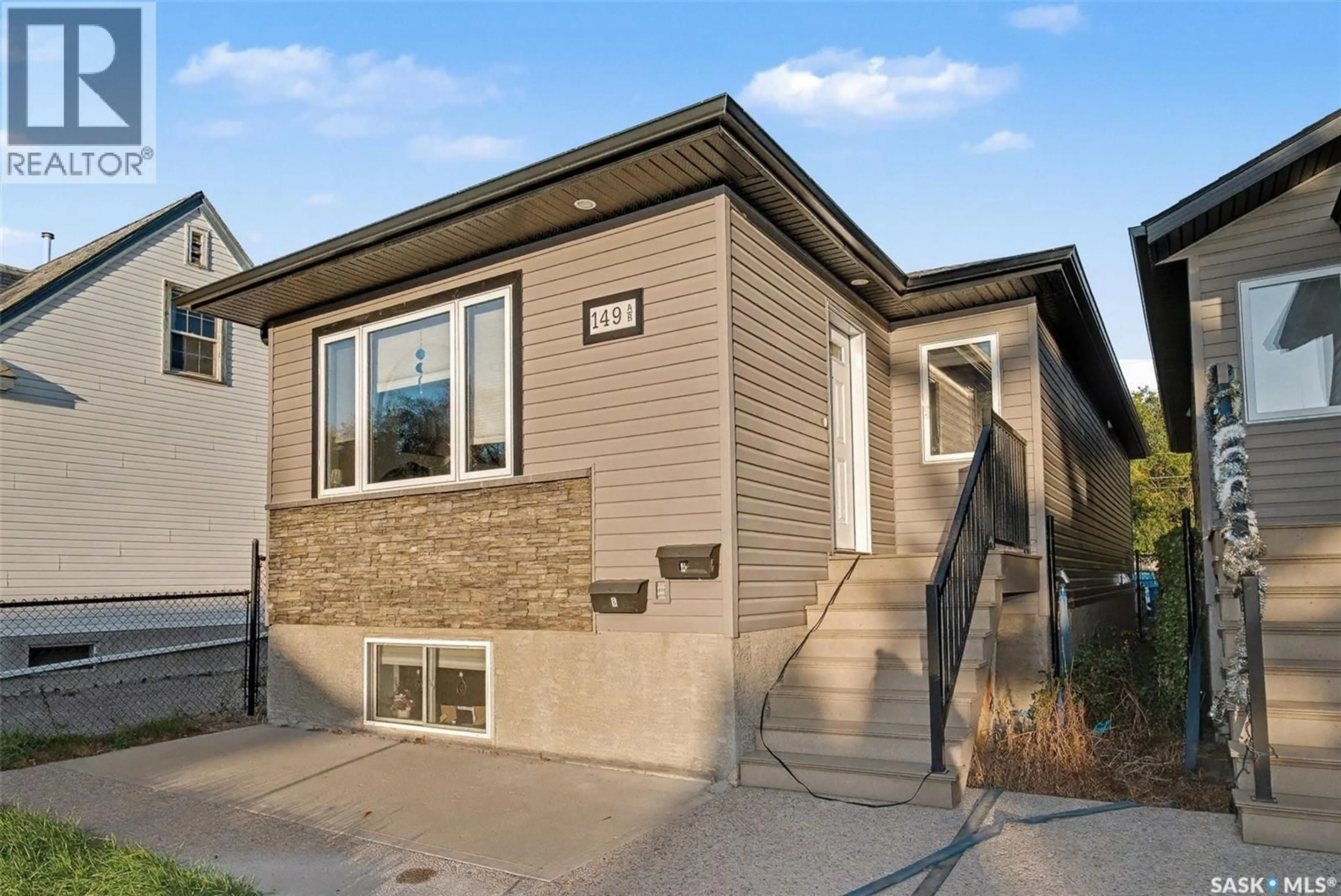 Home with vinyl exterior material, street for 149 OSLER STREET, Regina Saskatchewan S4R1V3