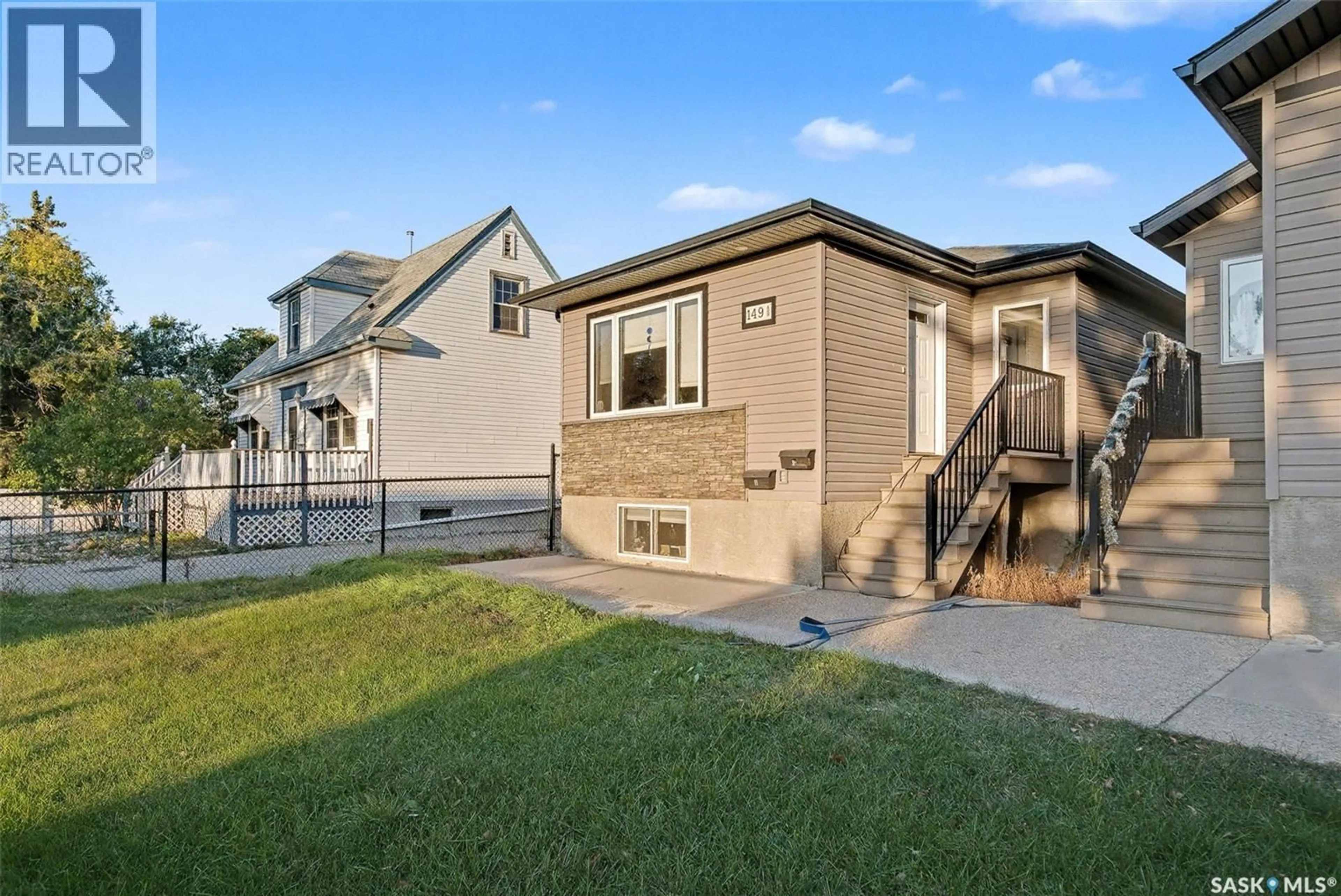 Home with vinyl exterior material, street for 149 OSLER STREET, Regina Saskatchewan S4R1V3