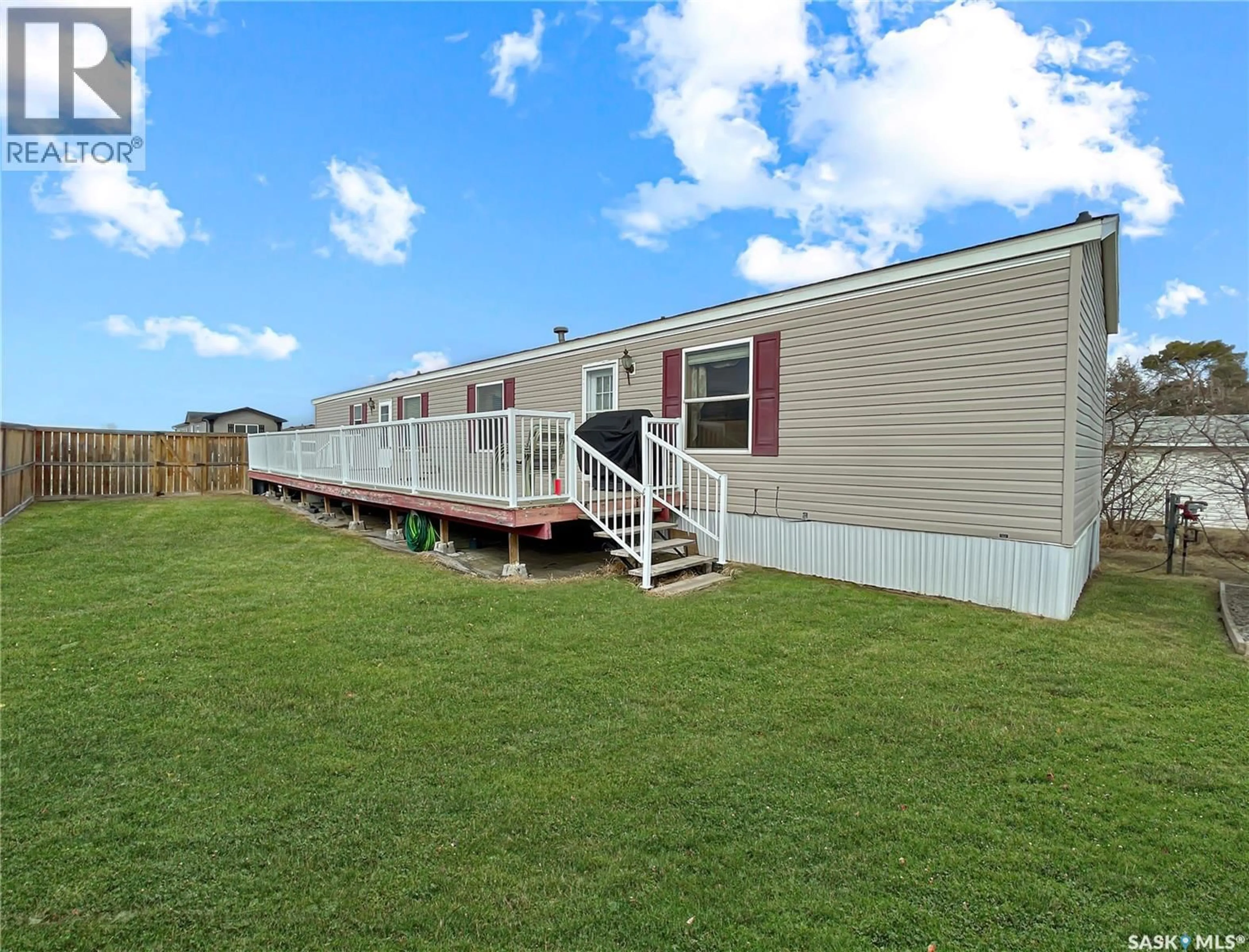 Home with vinyl exterior material, water/lake/river/ocean view for 128 PRAIRIE SUN COURT, Swift Current Saskatchewan S9H3X6