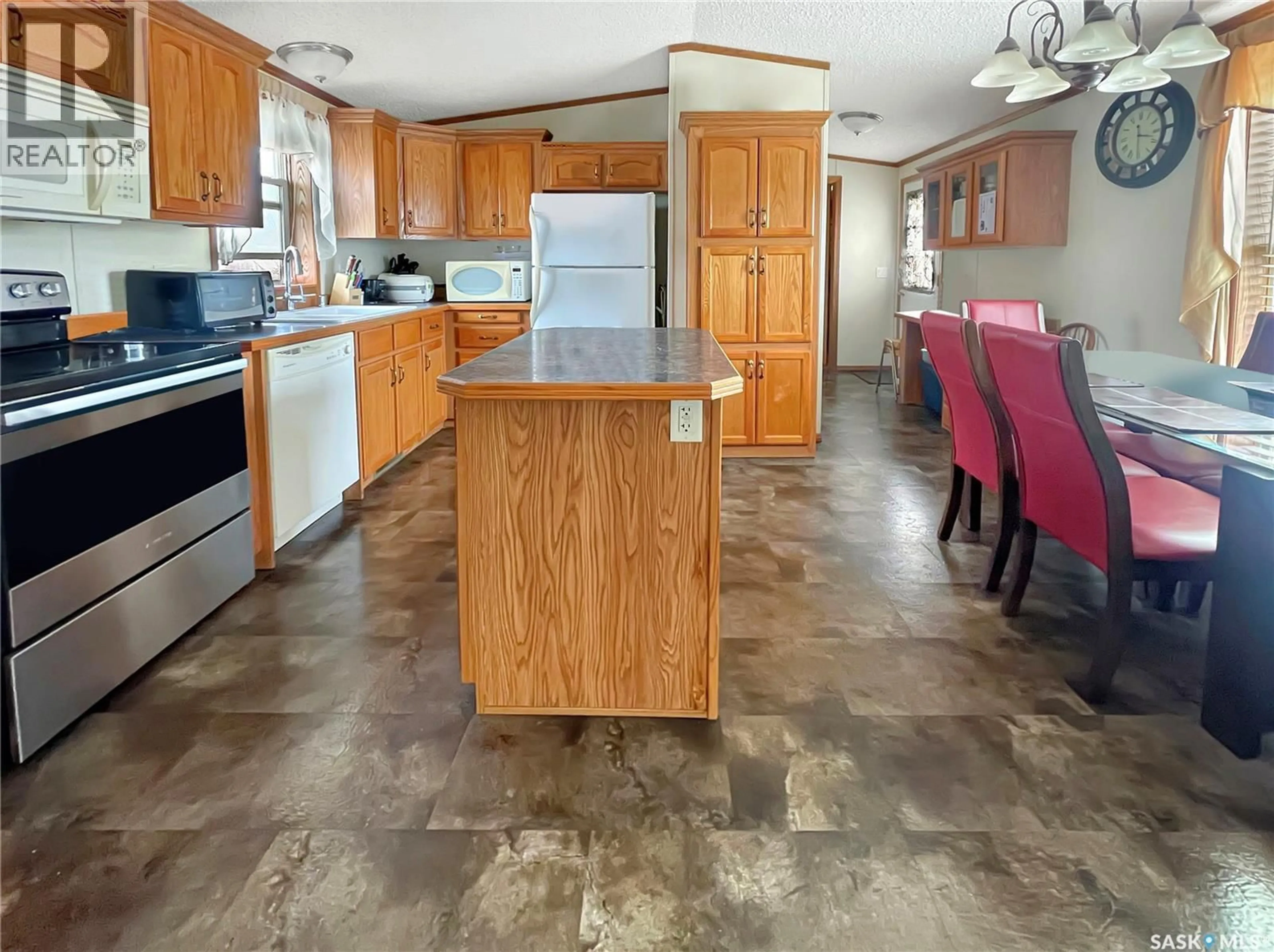 Open concept kitchen, ceramic/tile floor for 128 PRAIRIE SUN COURT, Swift Current Saskatchewan S9H3X6