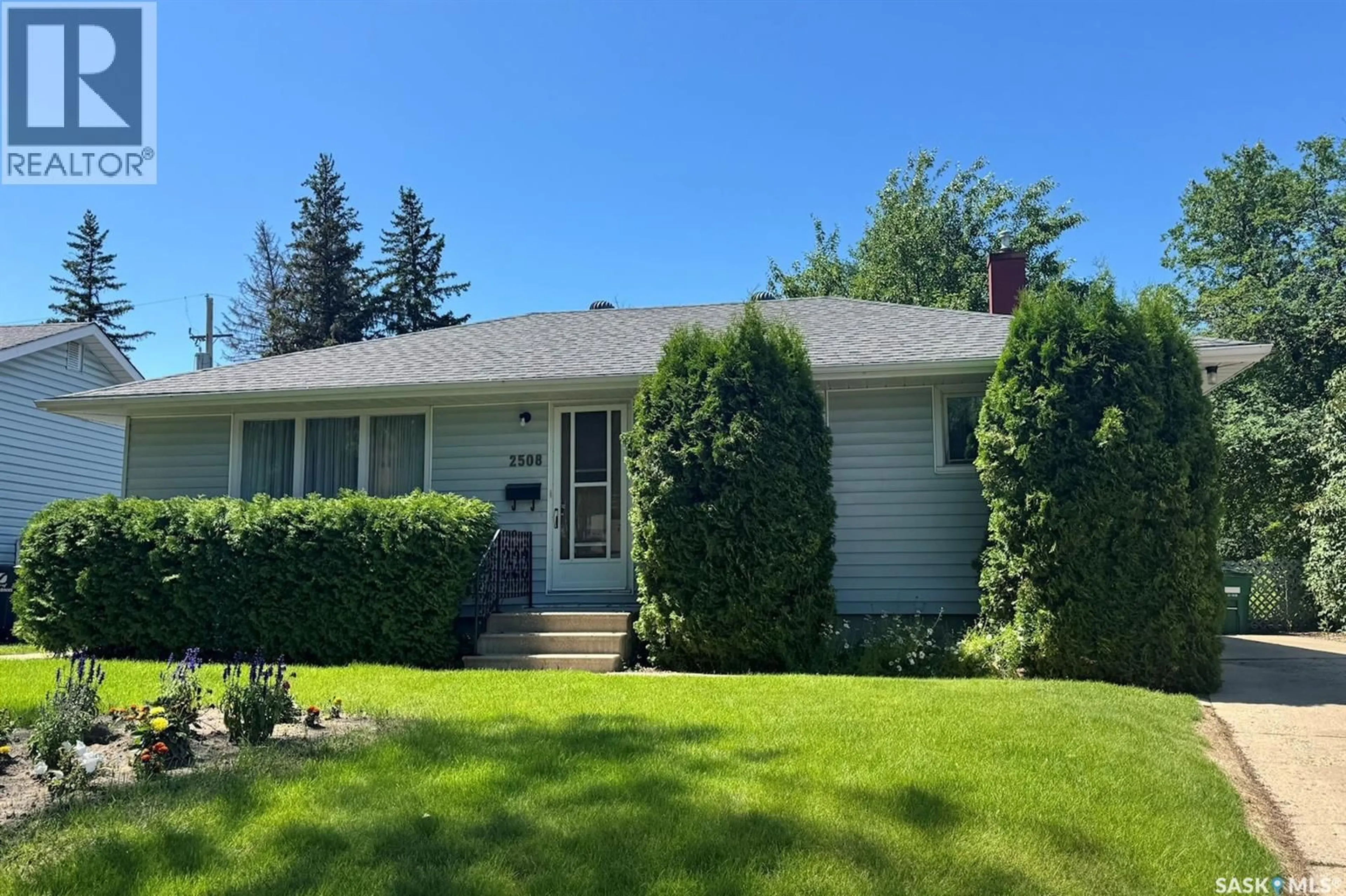Home with vinyl exterior material, street for 2508 PAUL CRESCENT, Saskatoon Saskatchewan S7J2T6