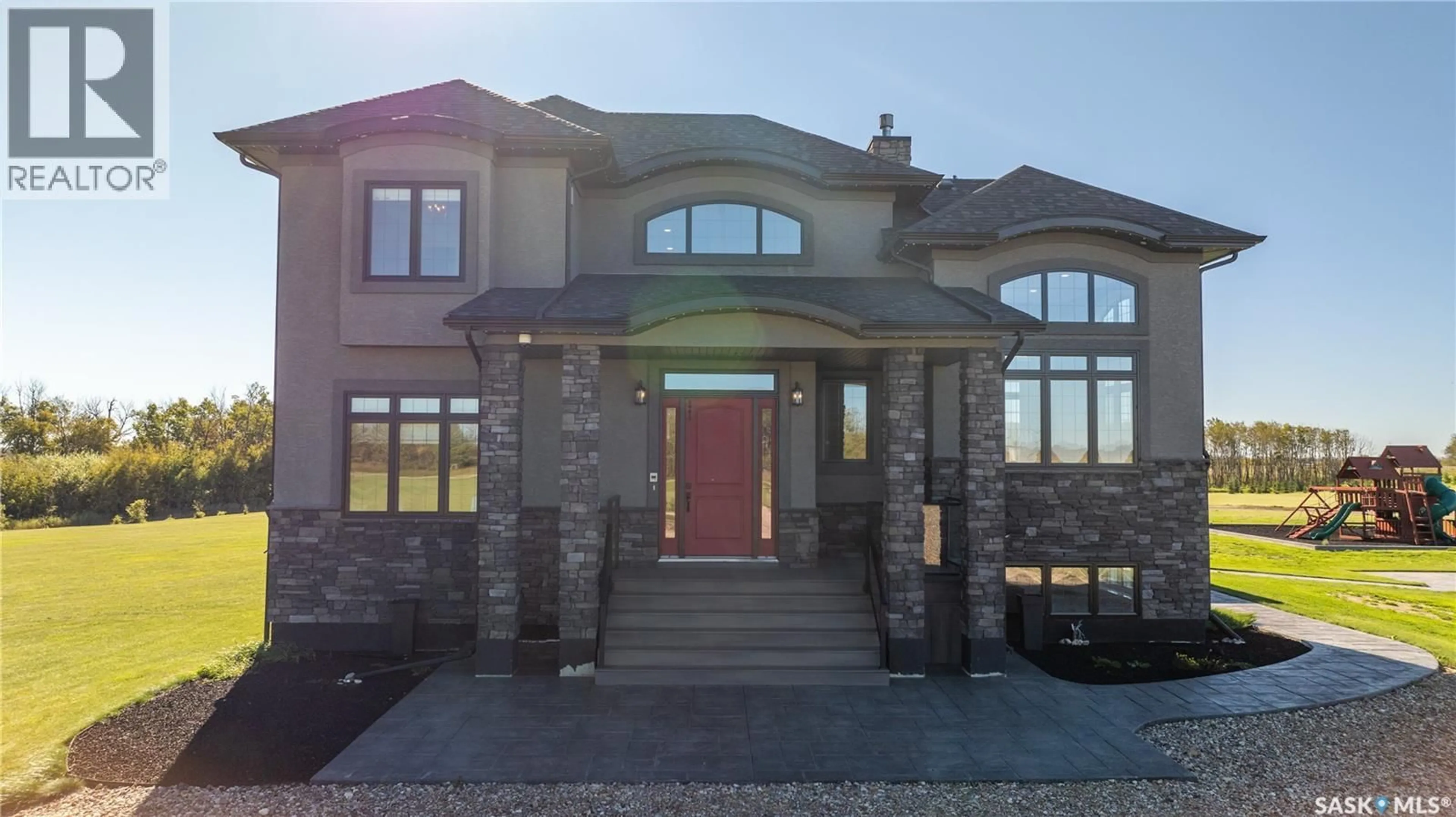Home with brick exterior material, street for PRESTIGE MANOR, Douglas Rm No. 436 Saskatchewan S0J1A0