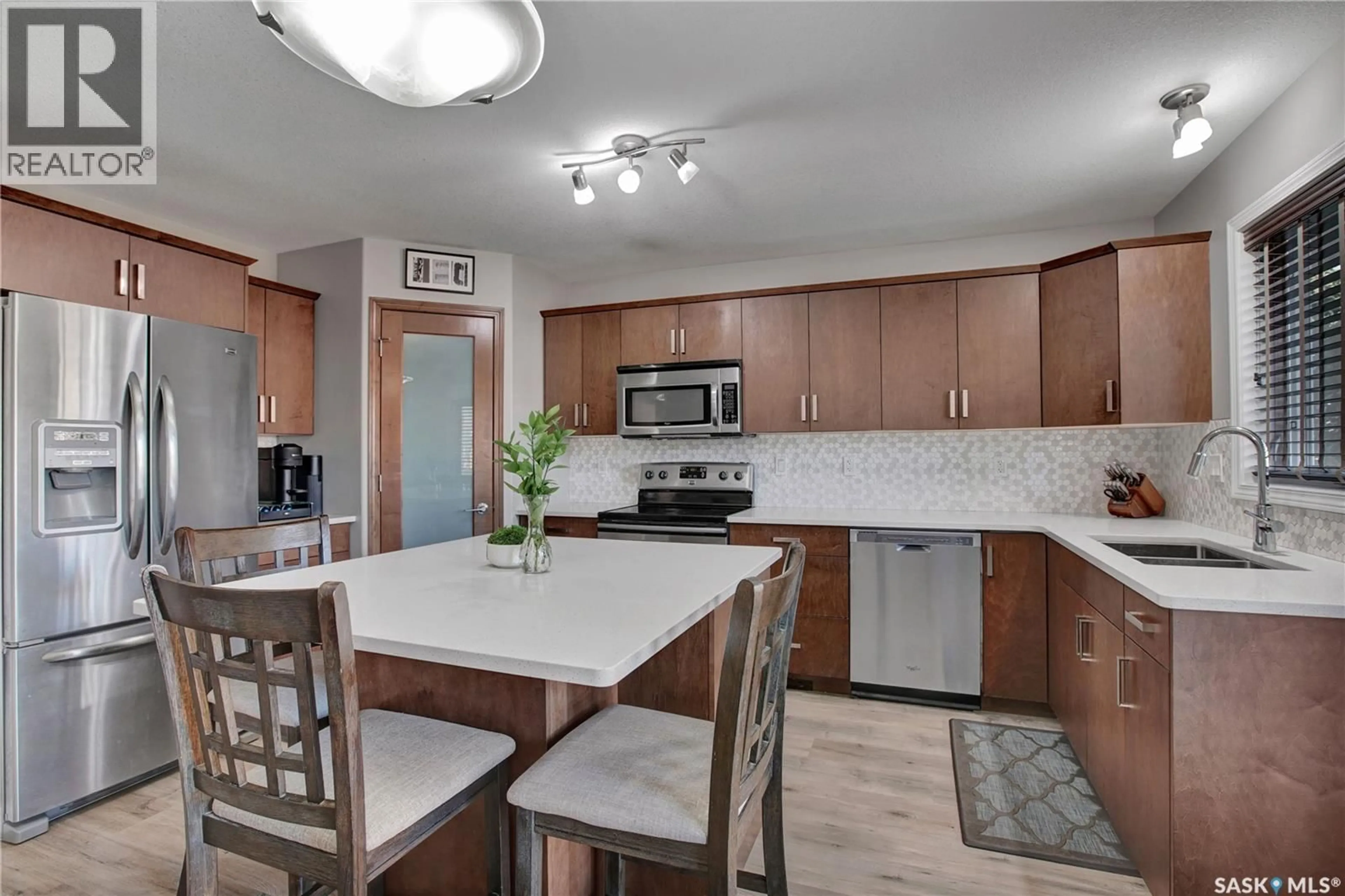 Open concept kitchen, ceramic/tile floor for 609 REIMER ROAD, Martensville Saskatchewan S0K0A2