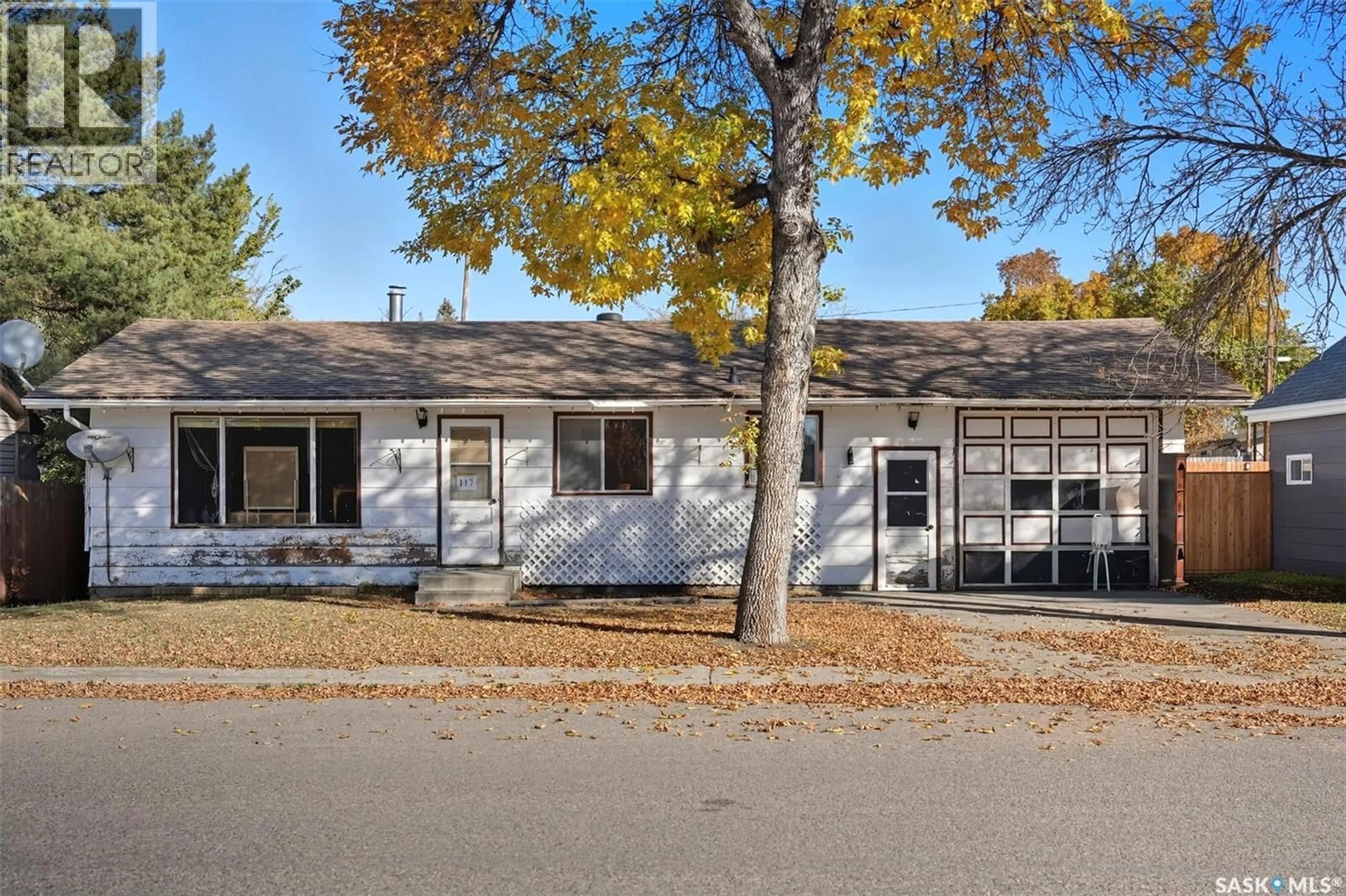 Home with vinyl exterior material, street for 117 3RD STREET, Langham Saskatchewan S0K2L0