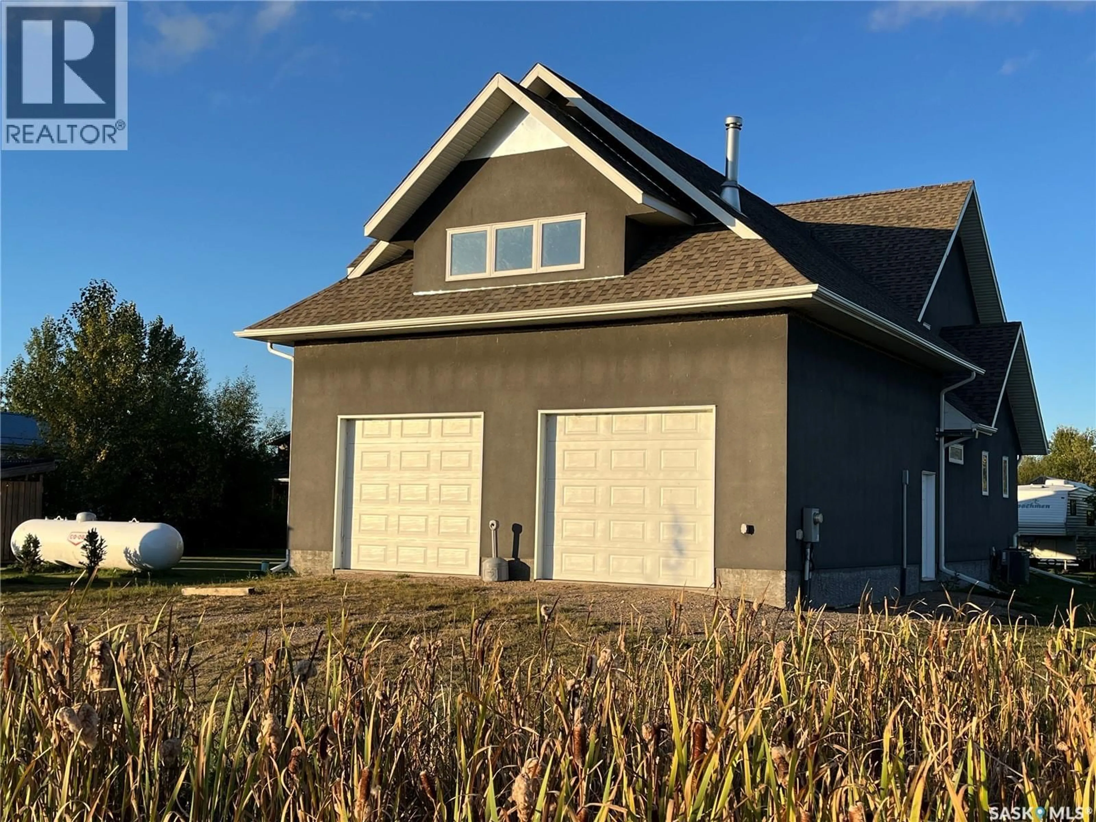 Home with vinyl exterior material, street for 23 PORCUPINE DRIVE, Big River Rm No. 555 Saskatchewan S0J0E0