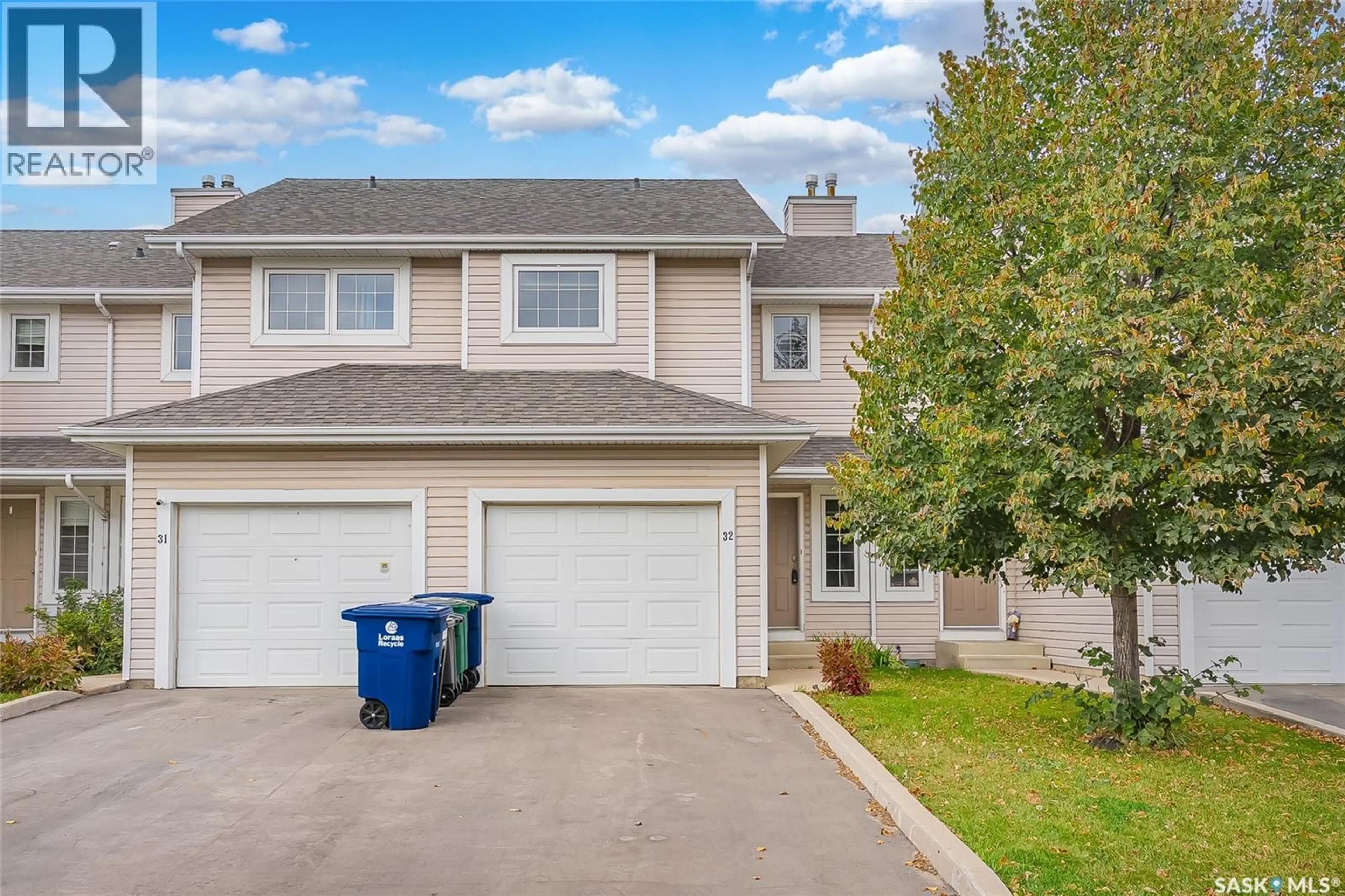 Home with vinyl exterior material, street for 32 327 BERINI DRIVE, Saskatoon Saskatchewan S7N4M7
