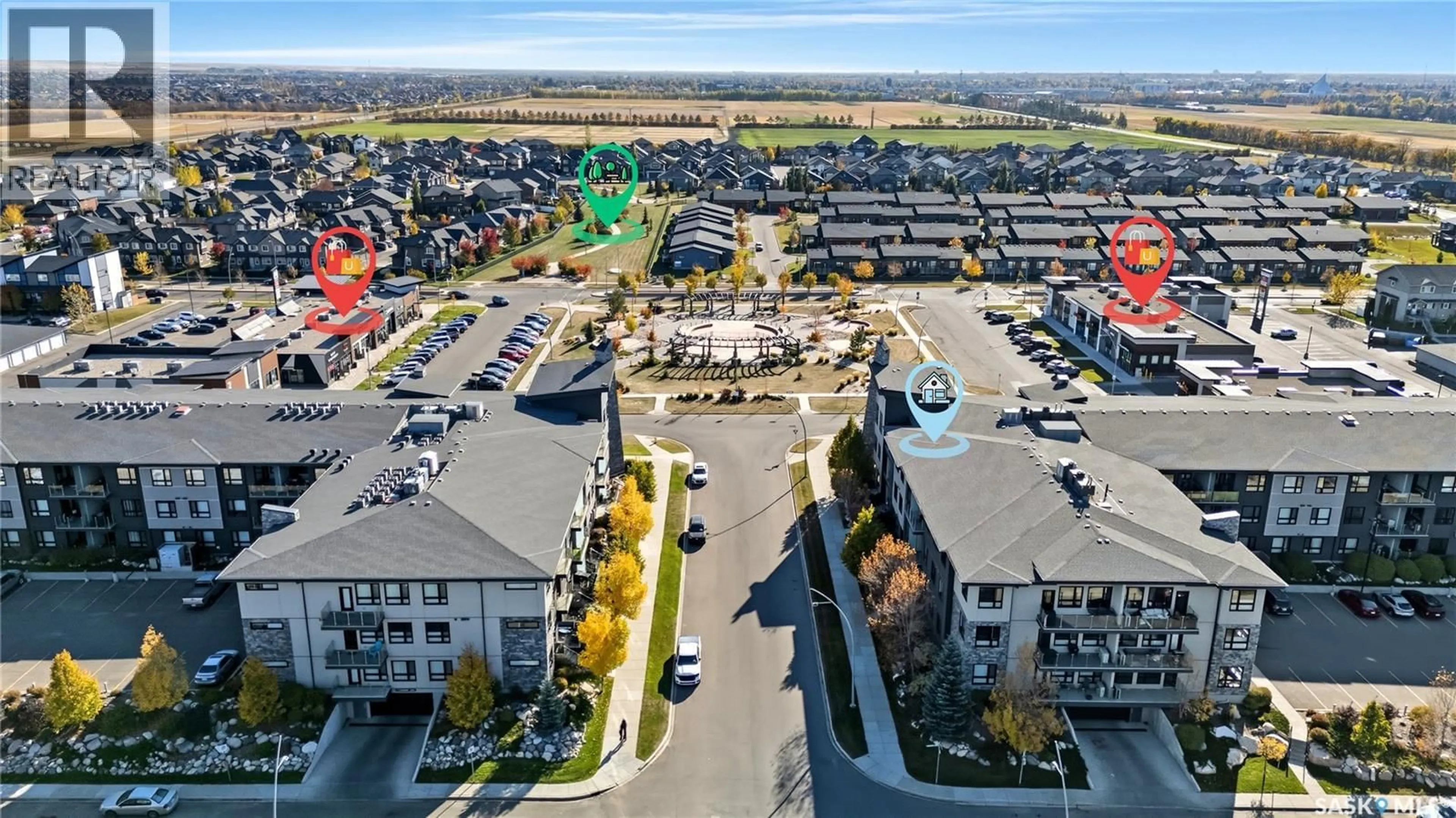 A pic from outside/outdoor area/front of a property/back of a property/a pic from drone, city buildings view from balcony for 221 235 EVERGREEN SQUARE, Saskatoon Saskatchewan S7W0T9