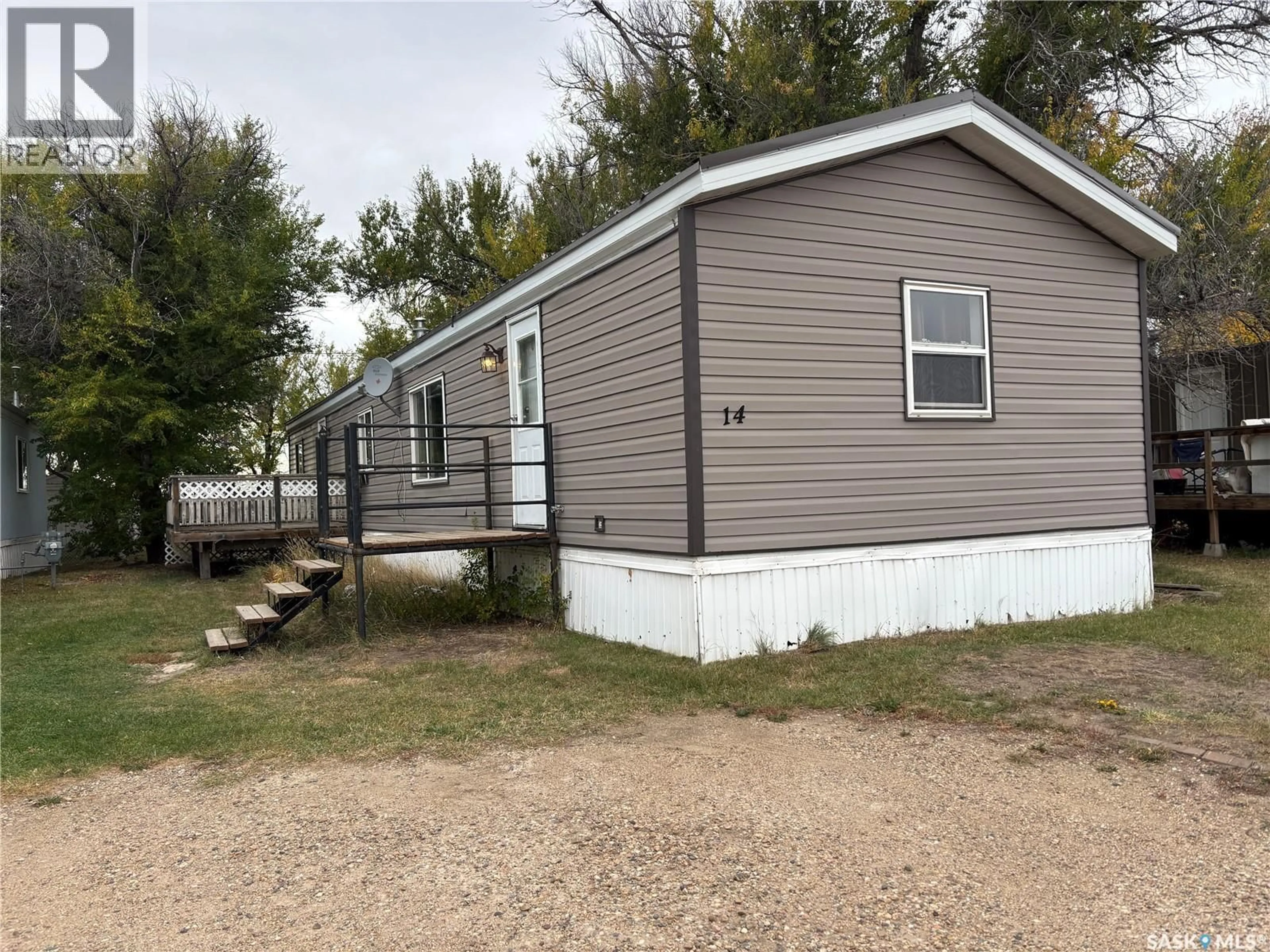 Home with vinyl exterior material, street for 14 CYPRESS MOBILE HOME PARK, Maple Creek Saskatchewan S0N1N0