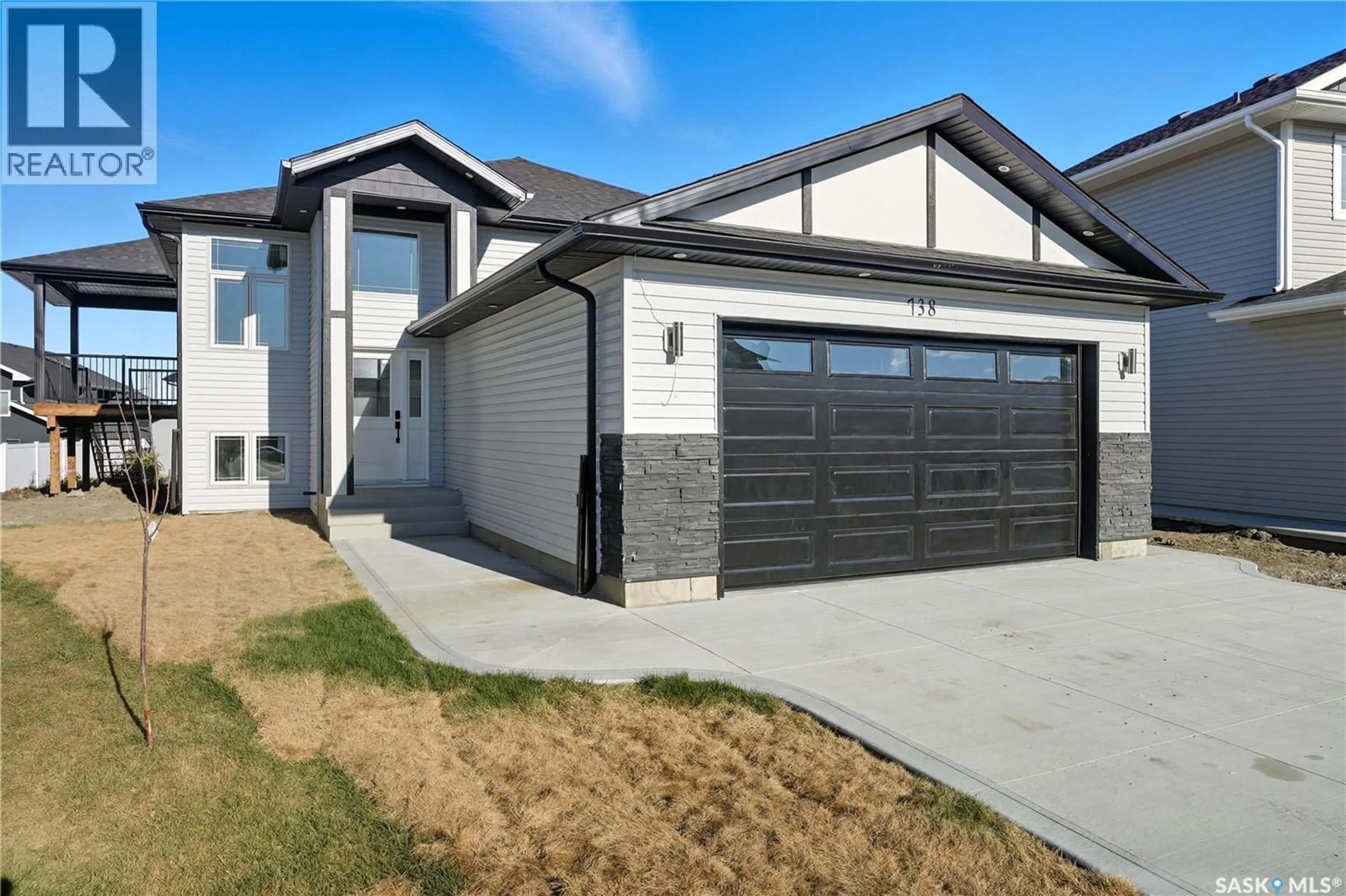 Home with vinyl exterior material, street for 738 BENTLEY MANOR, Saskatoon Saskatchewan S7L6P2