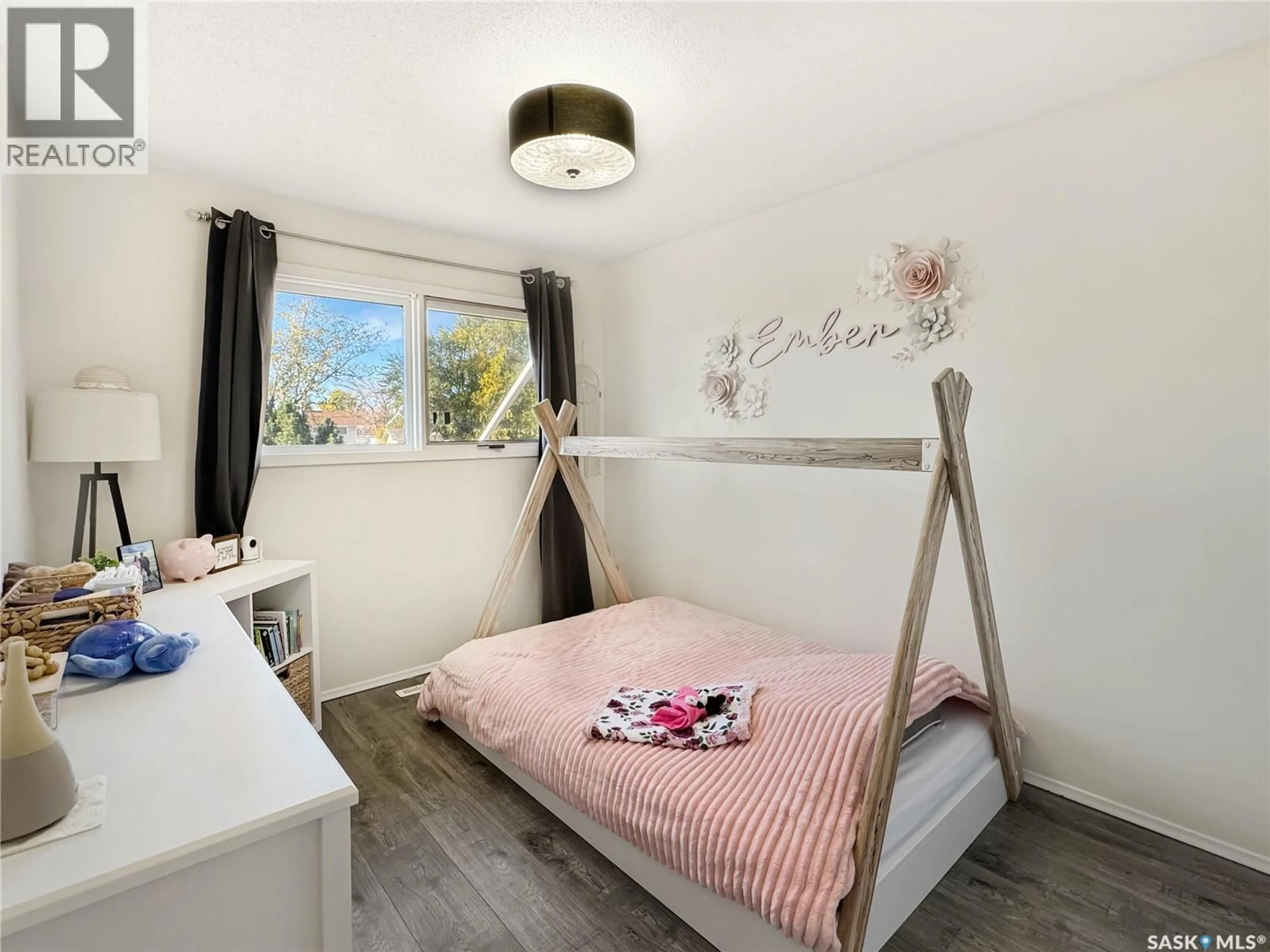 Bedroom with bed, wood/laminate floor for 264 7TH AVENUE, Unity Saskatchewan S0K4L0