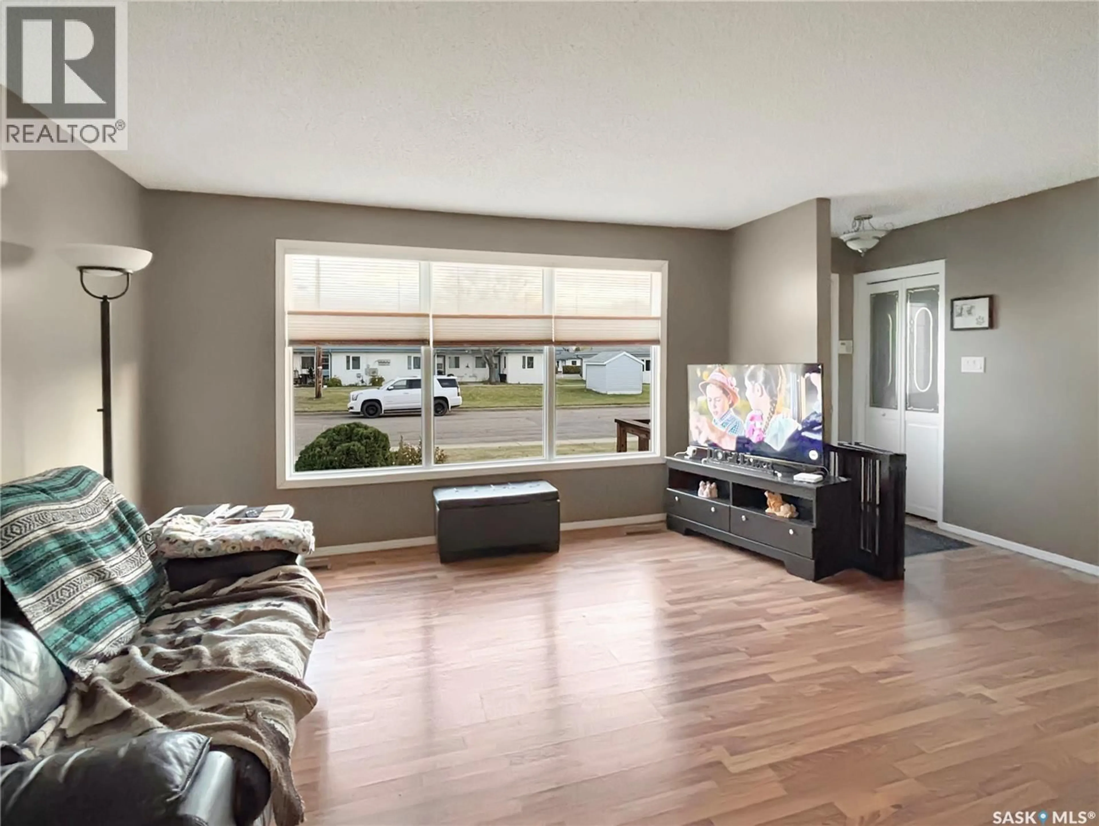 Living room with furniture, unknown for 9807 21ST AVENUE, North Battleford Saskatchewan S9A3K4