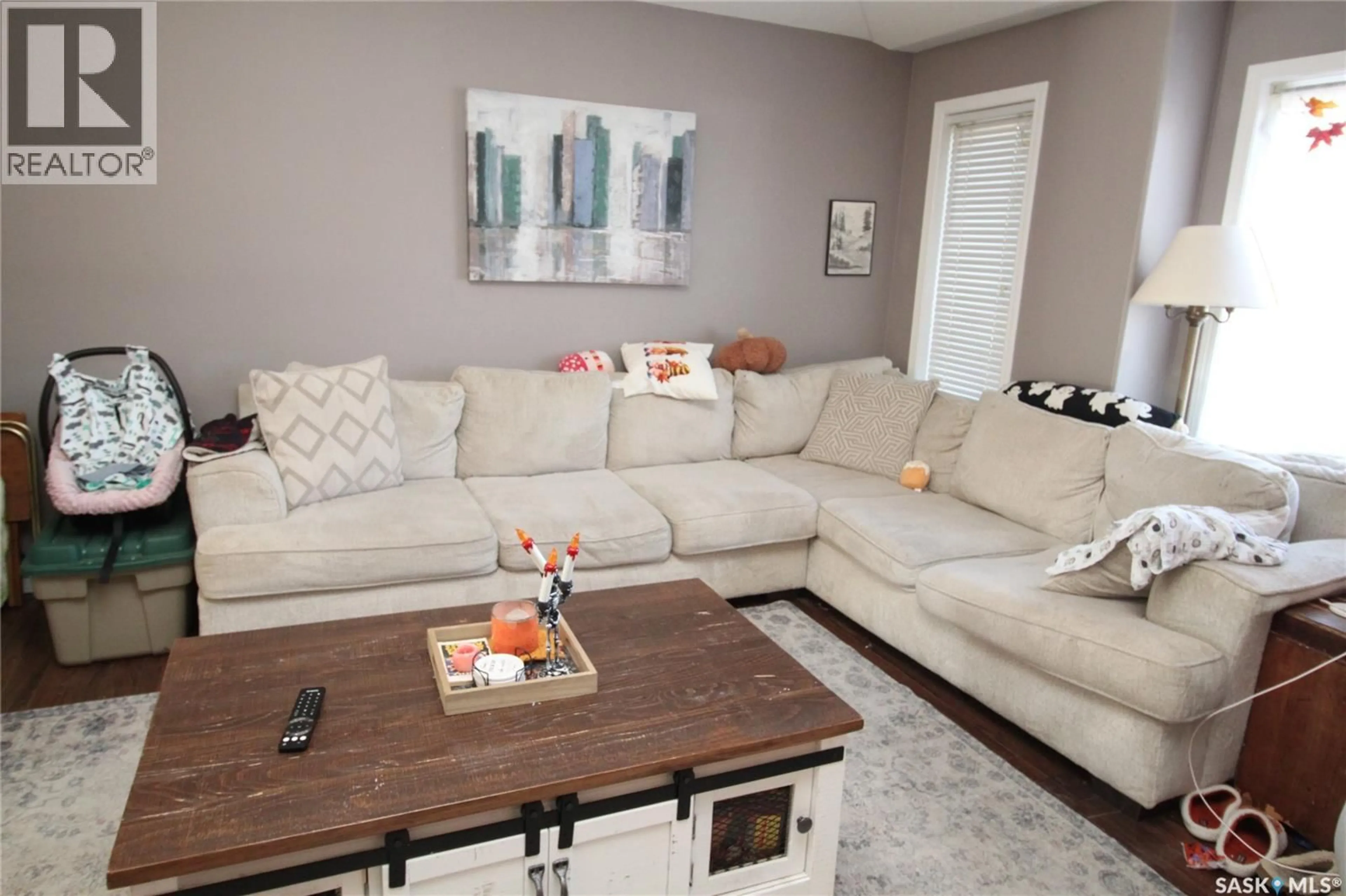 Living room with furniture, unknown for 302 3RD STREET, Dundurn Saskatchewan S0K1K0