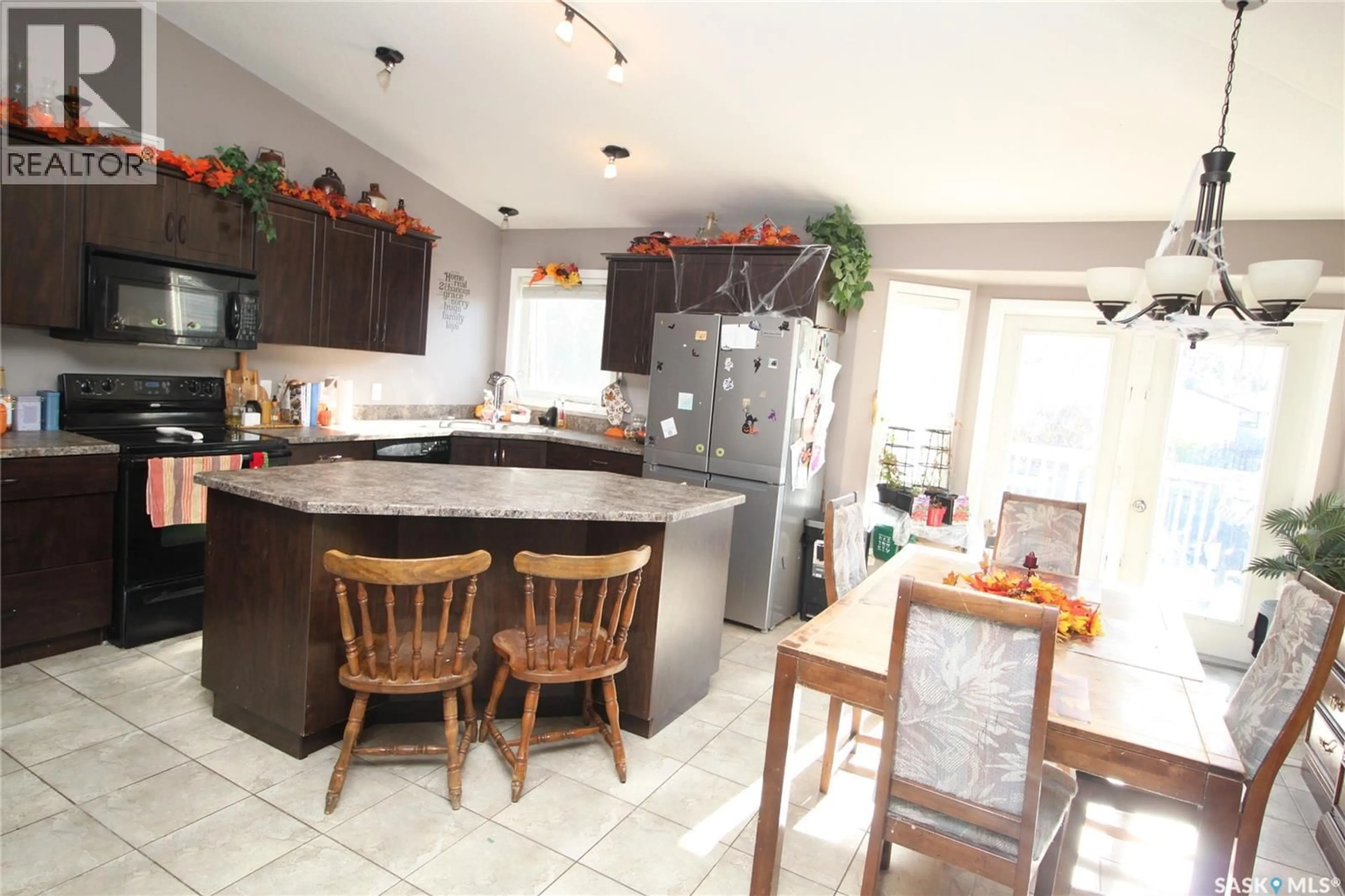Open concept kitchen, ceramic/tile floor for 302 3RD STREET, Dundurn Saskatchewan S0K1K0