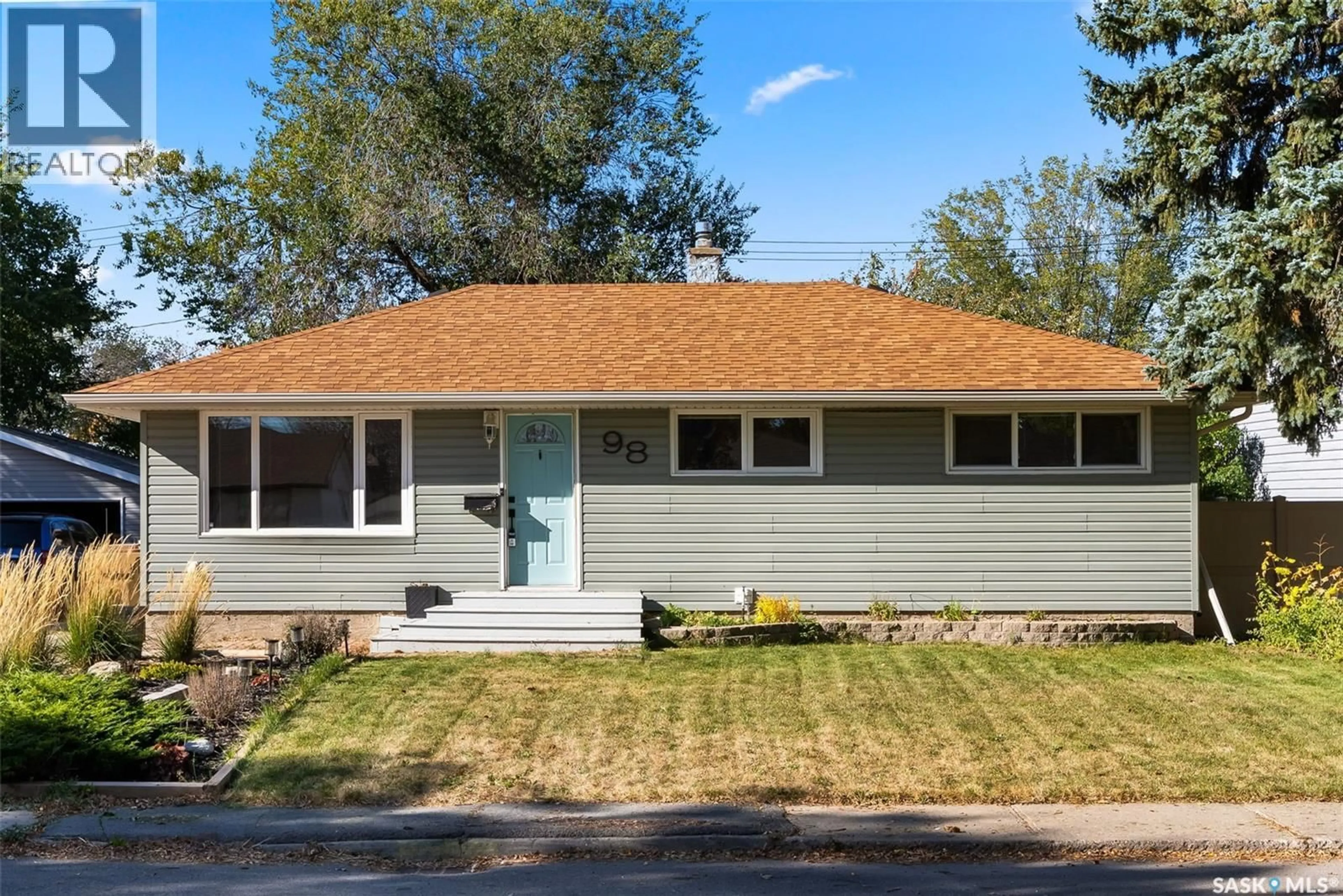 Home with vinyl exterior material, street for 98 COLDWELL ROAD, Regina Saskatchewan S4R4K5