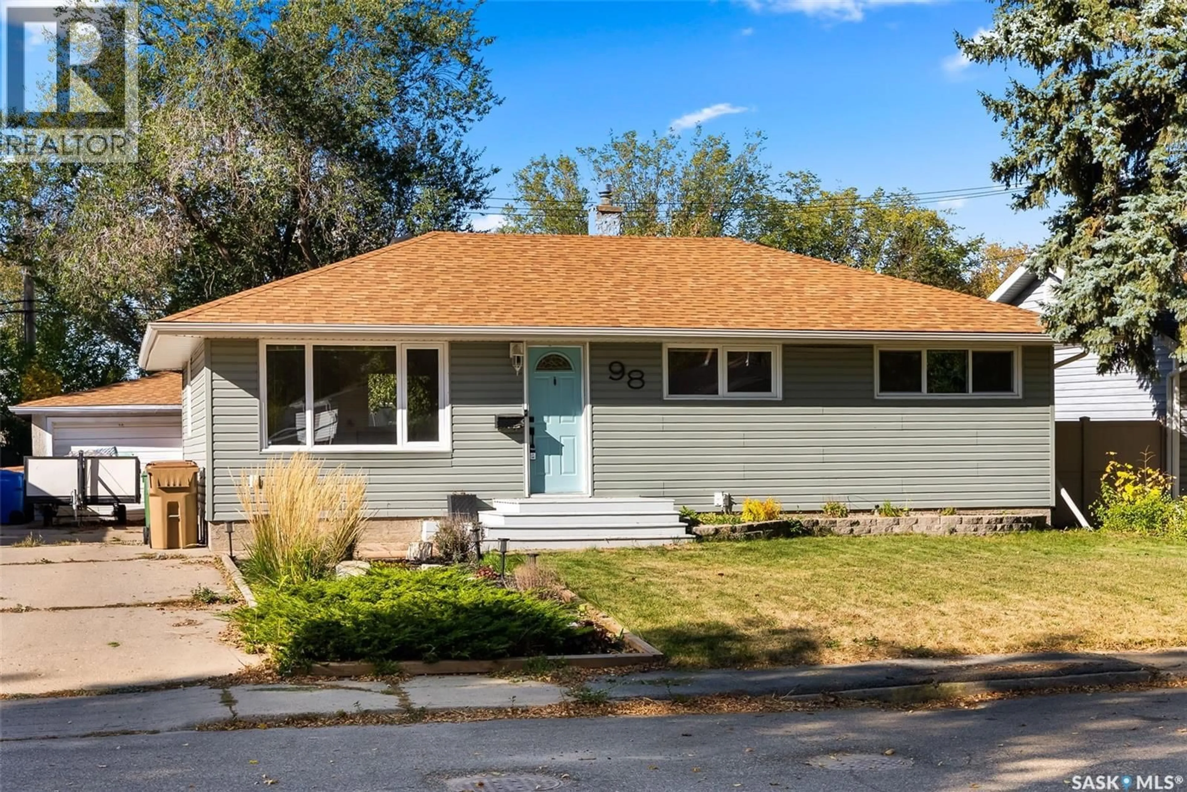 Home with vinyl exterior material, street for 98 COLDWELL ROAD, Regina Saskatchewan S4R4K5