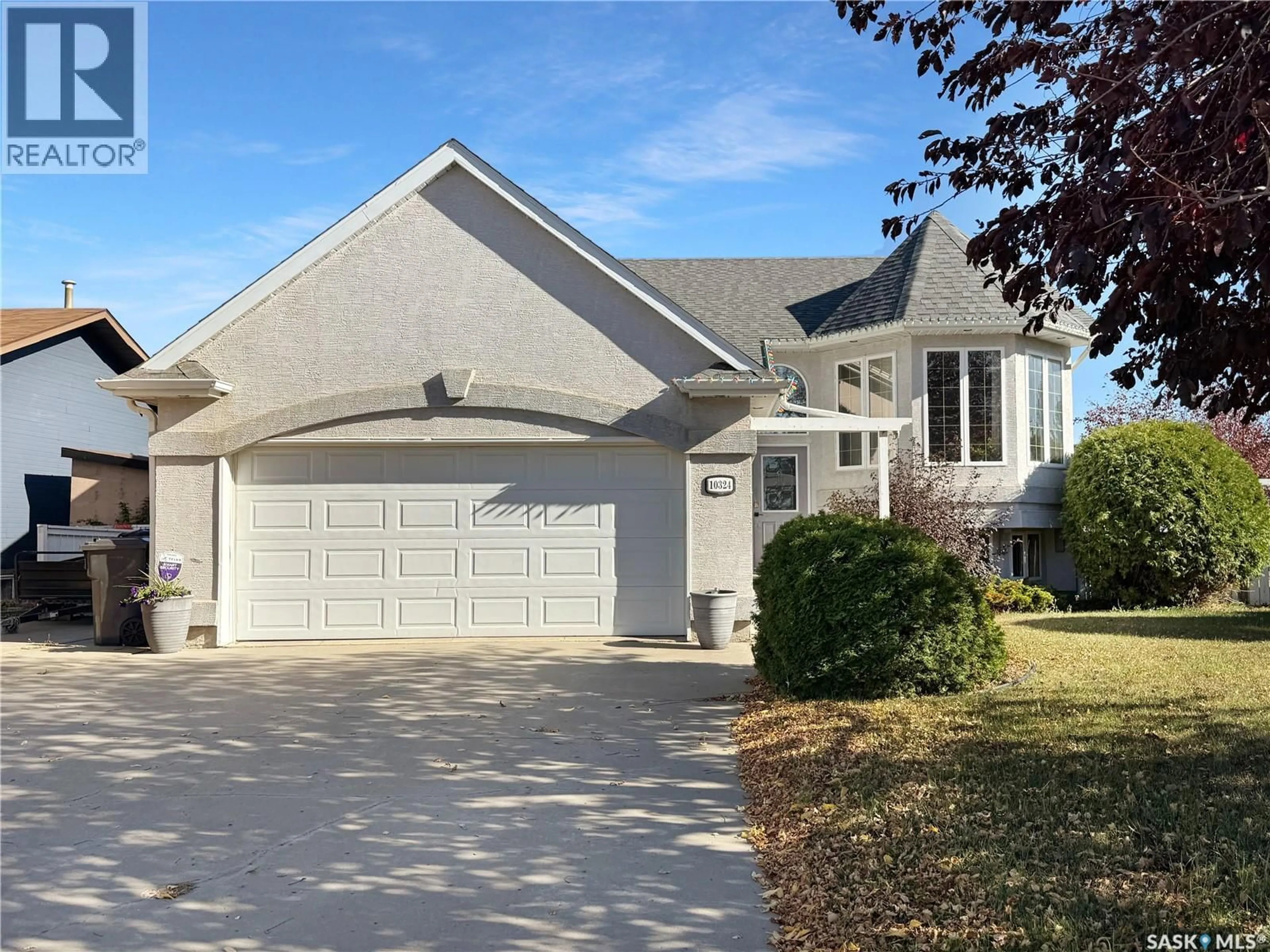 Home with vinyl exterior material, street for 10324 BUNCE CRESCENT, North Battleford Saskatchewan S9A3Y4