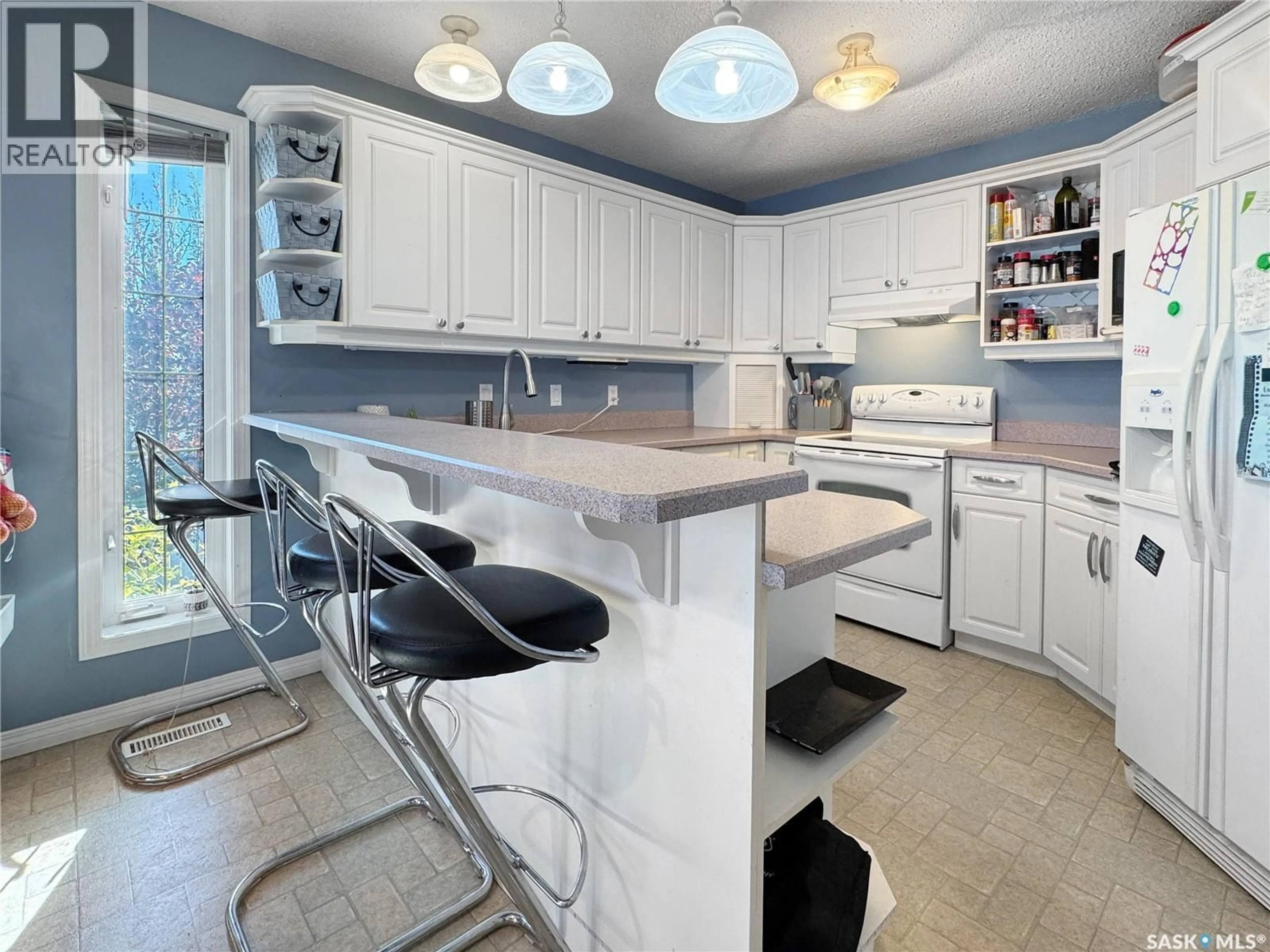 Open concept kitchen, ceramic/tile floor for 10324 BUNCE CRESCENT, North Battleford Saskatchewan S9A3Y4