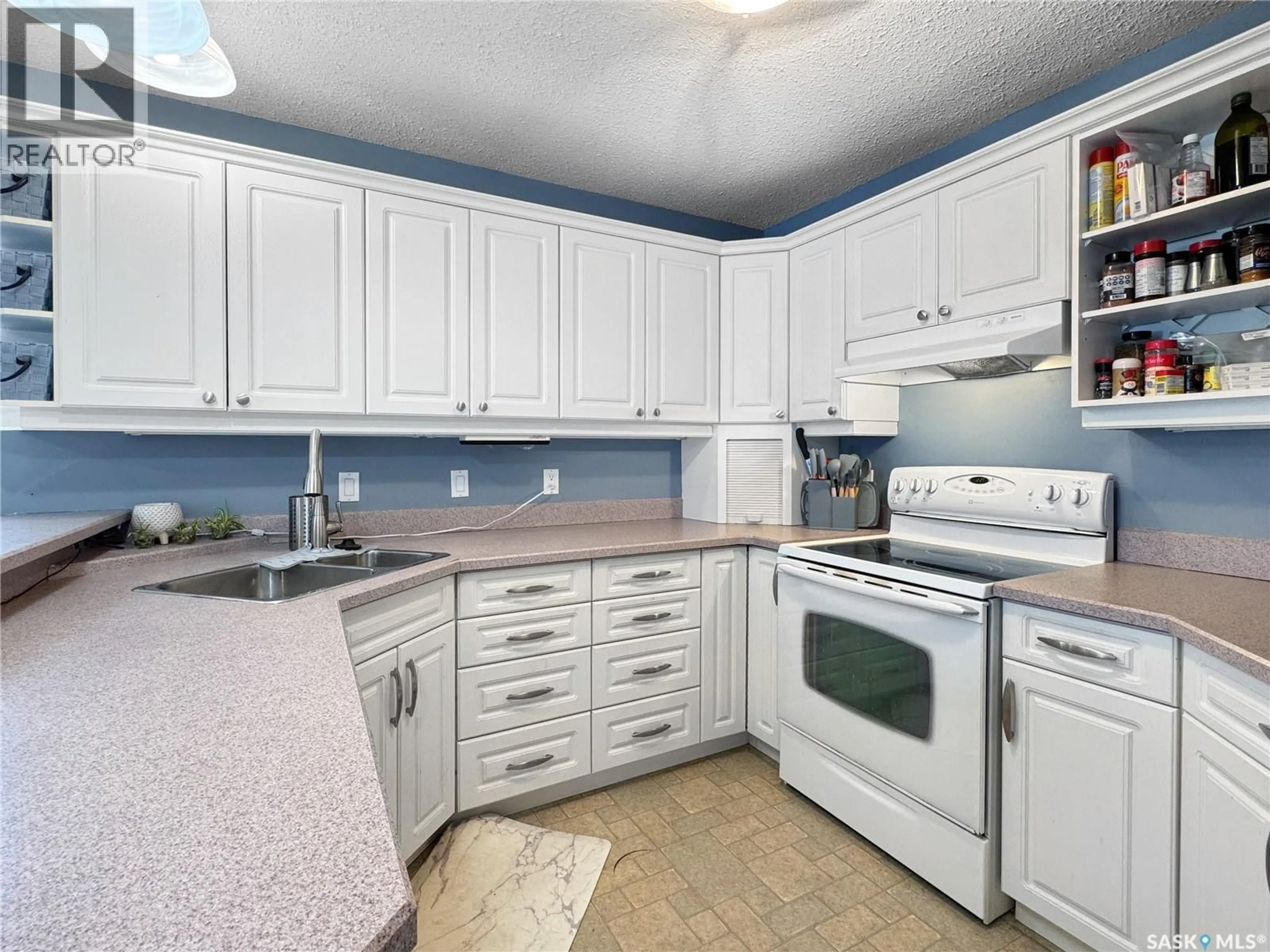 Standard kitchen, ceramic/tile floor for 10324 BUNCE CRESCENT, North Battleford Saskatchewan S9A3Y4