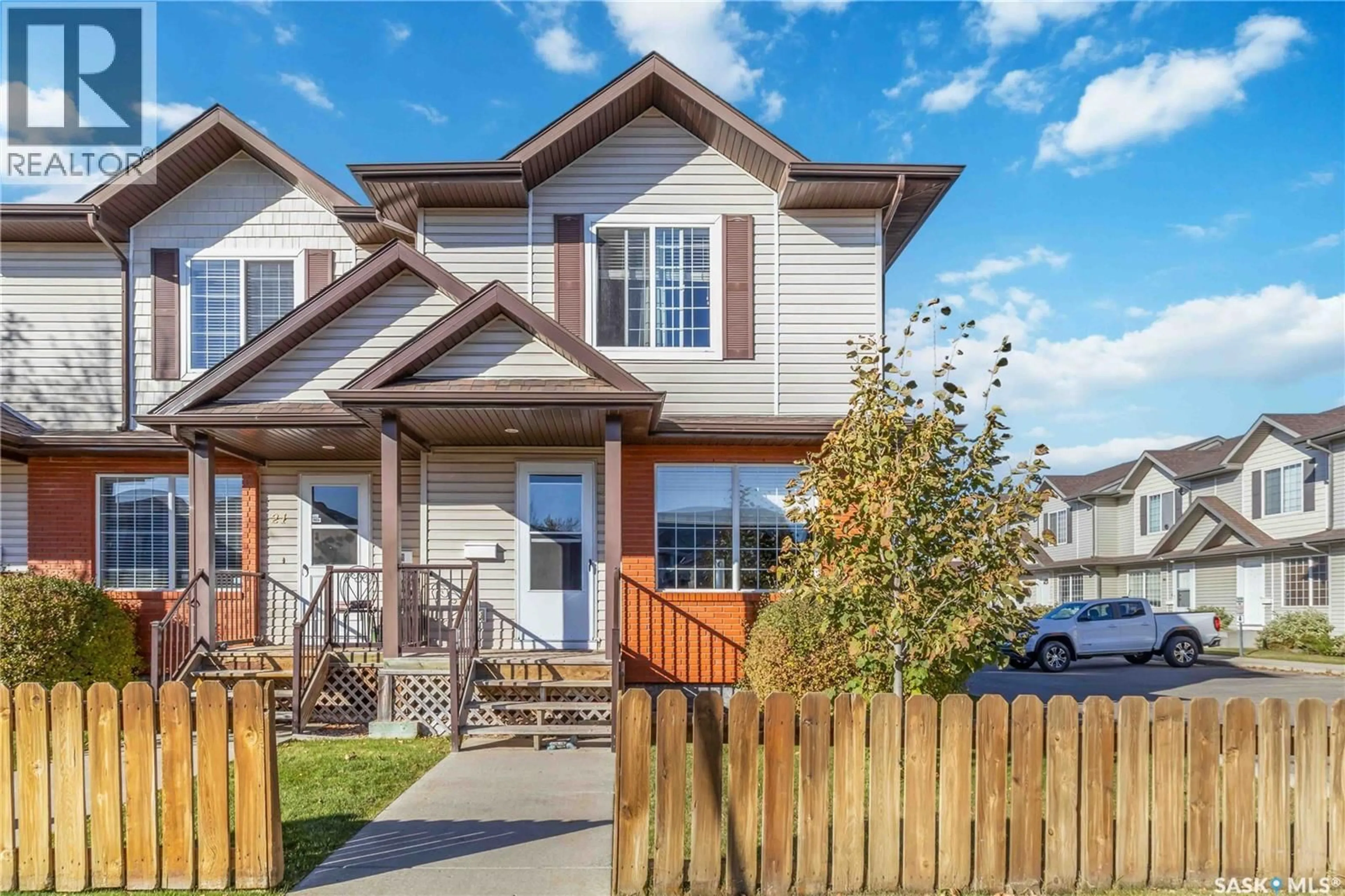 Home with vinyl exterior material, street for 20 135 KEEDWELL STREET, Saskatoon Saskatchewan S7W0A3