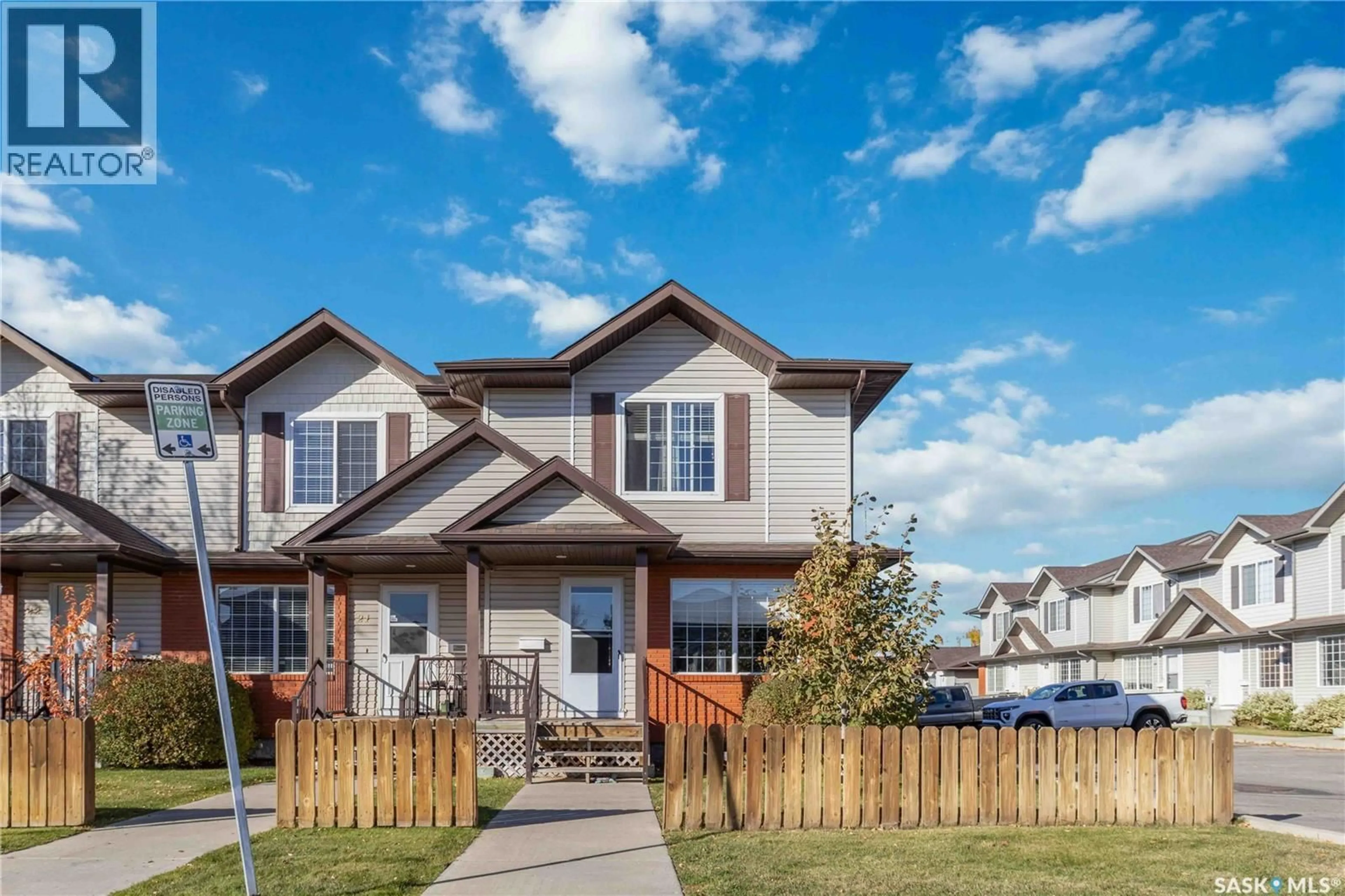 Home with vinyl exterior material, street for 20 135 KEEDWELL STREET, Saskatoon Saskatchewan S7W0A3