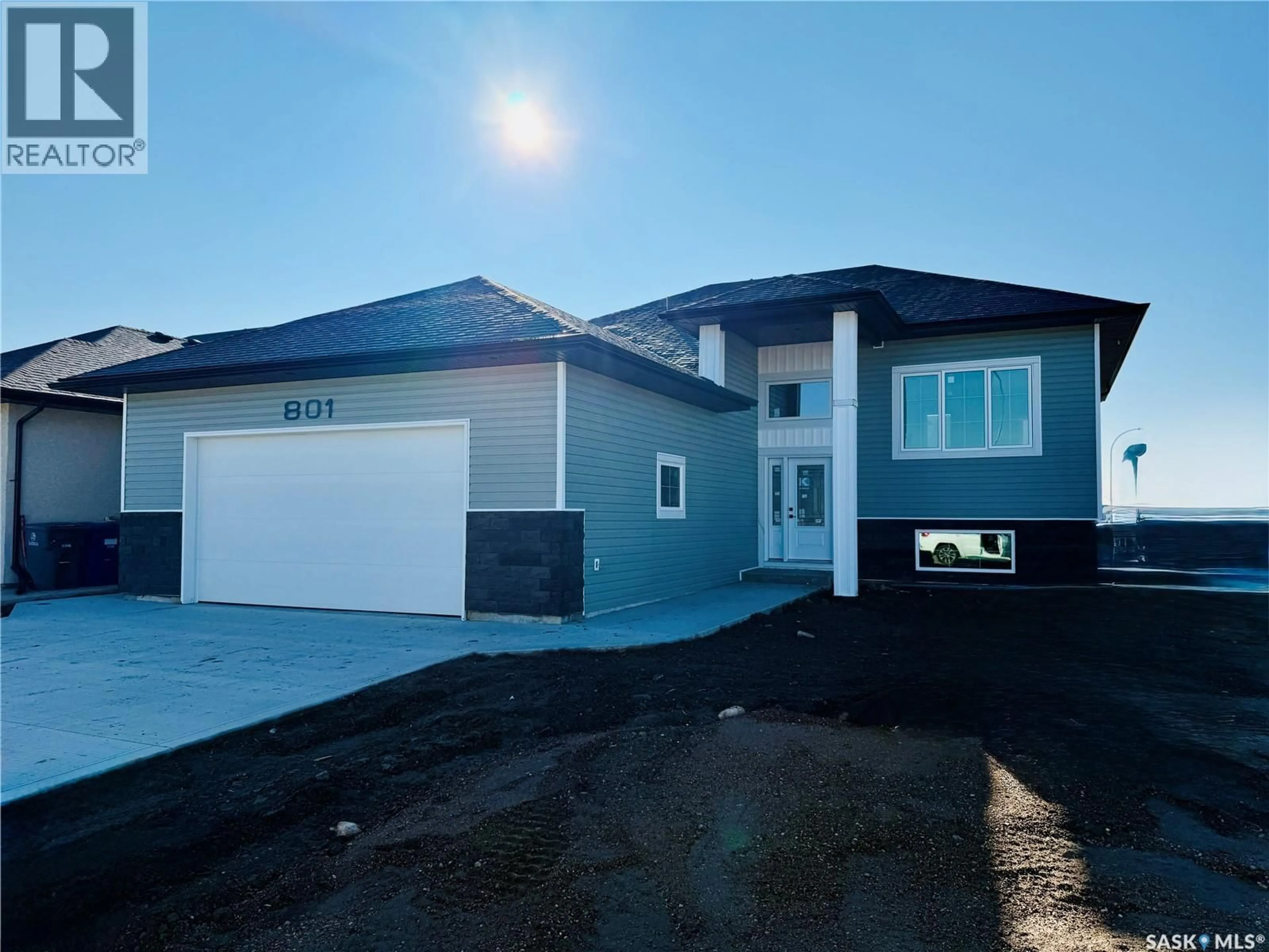 Home with vinyl exterior material, street for 801 WEIR CRESCENT, Warman Saskatchewan S0K4S4